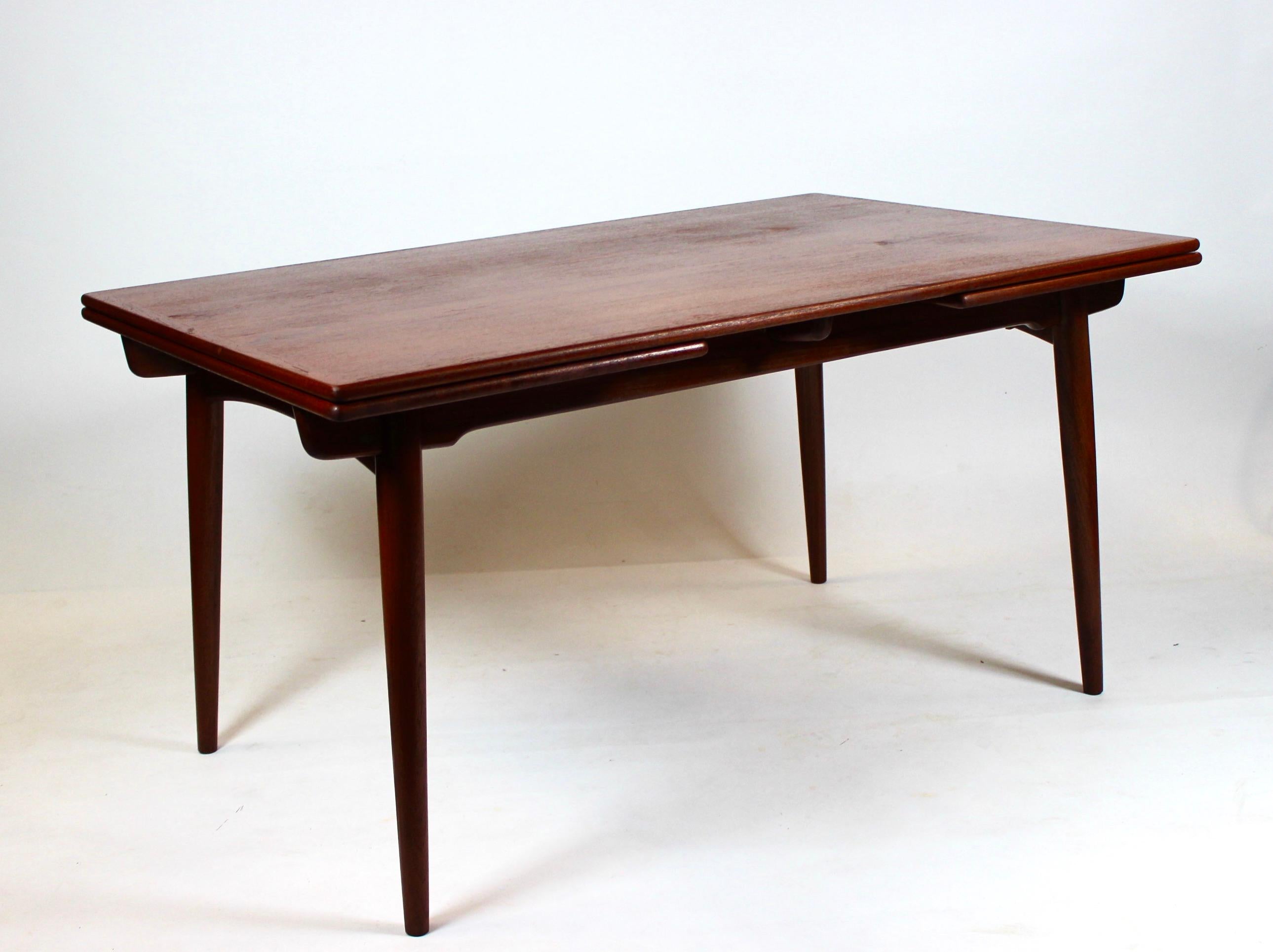Mid-20th Century Dining Table with Extensions in Teak Designed by Hans J. Wegner, 1960s For Sale