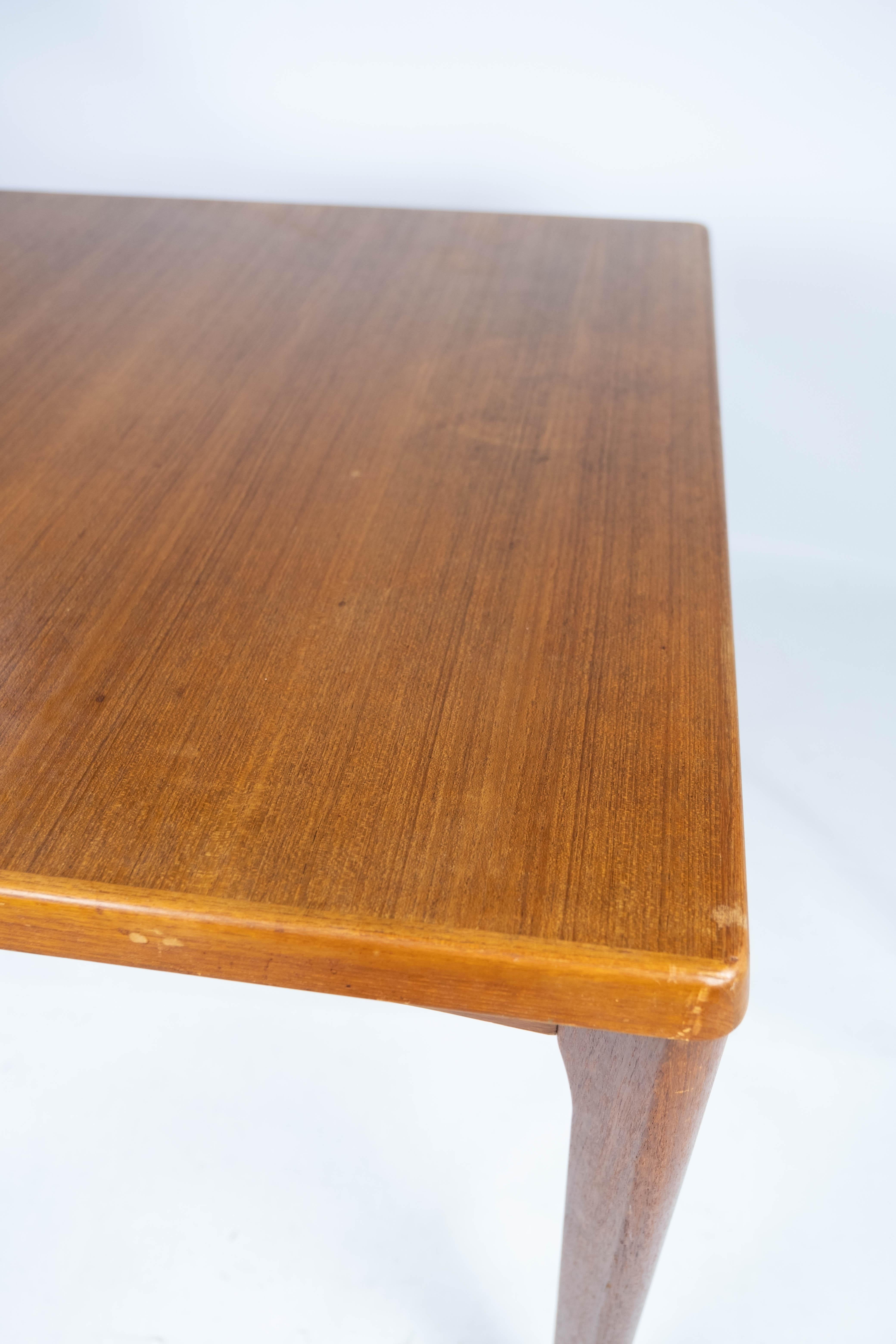 Mid-Century Modern Dining Table With Extentions Made In Teak By Henning Kjærnulf From 1960s For Sale