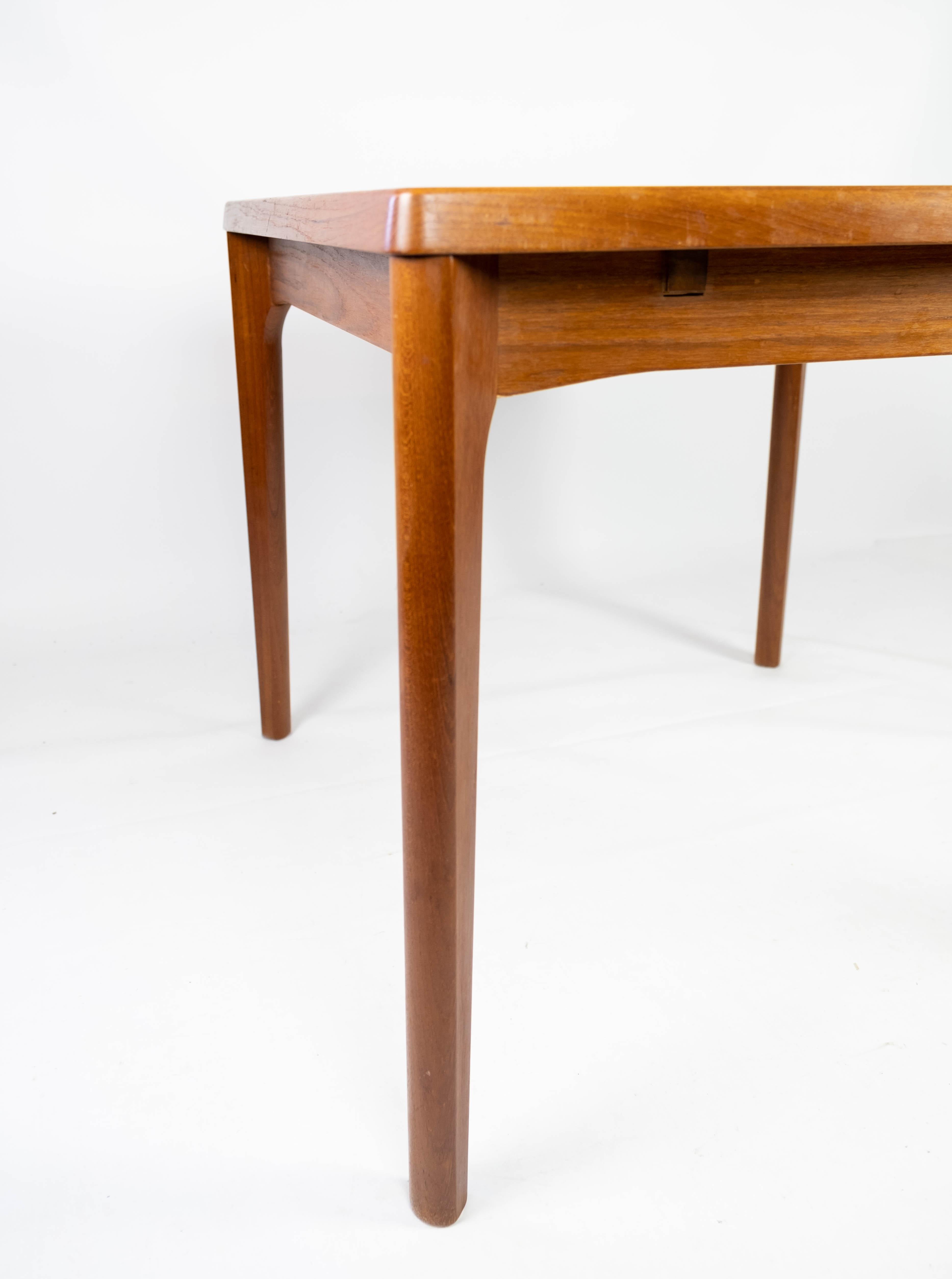 Danish Dining Table with Extentions in Teak Designed by Henning Kjærnulf from the 1960s