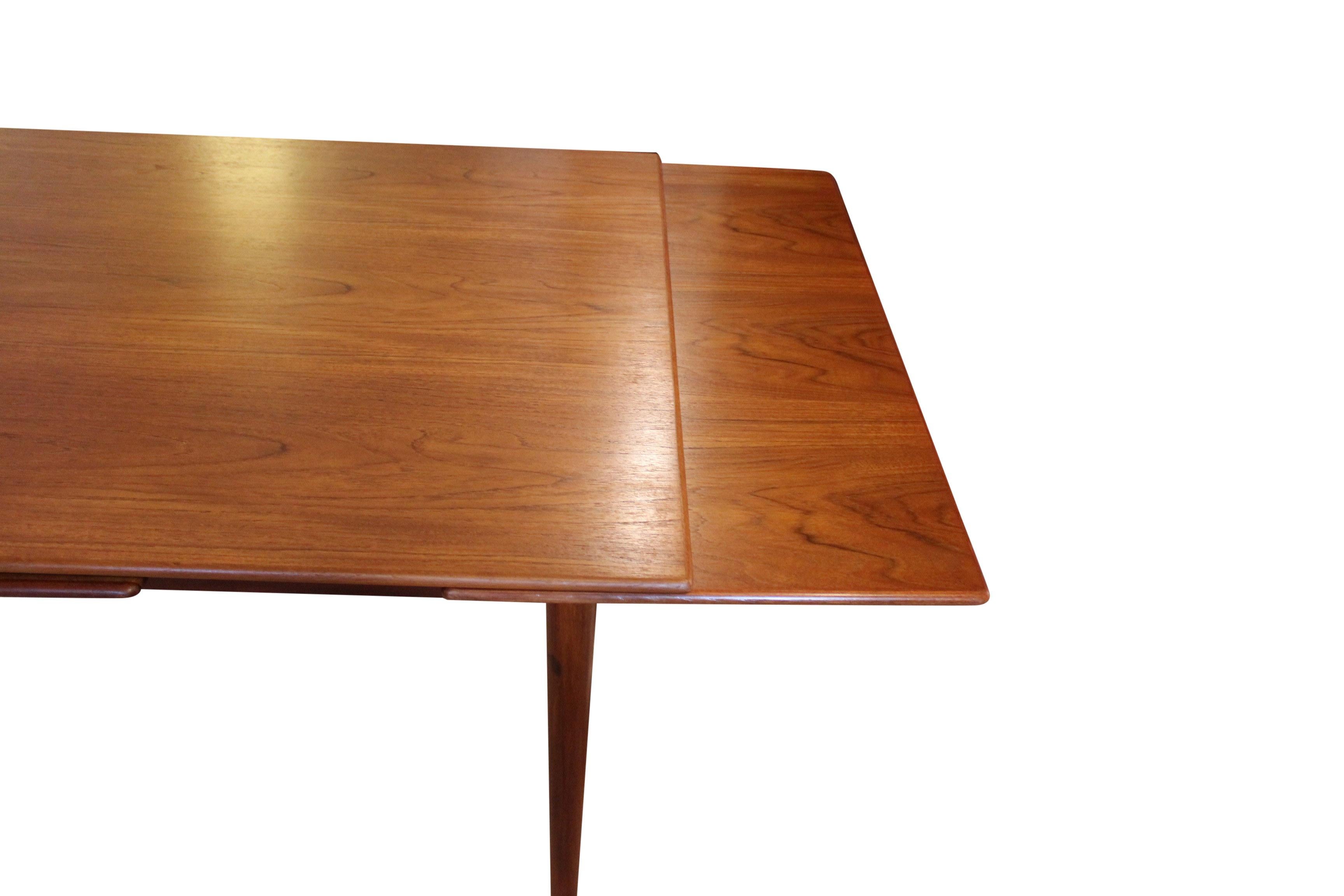 Mid-20th Century Dining Table with Extentions in Teak of Danish Design from the 1960s For Sale