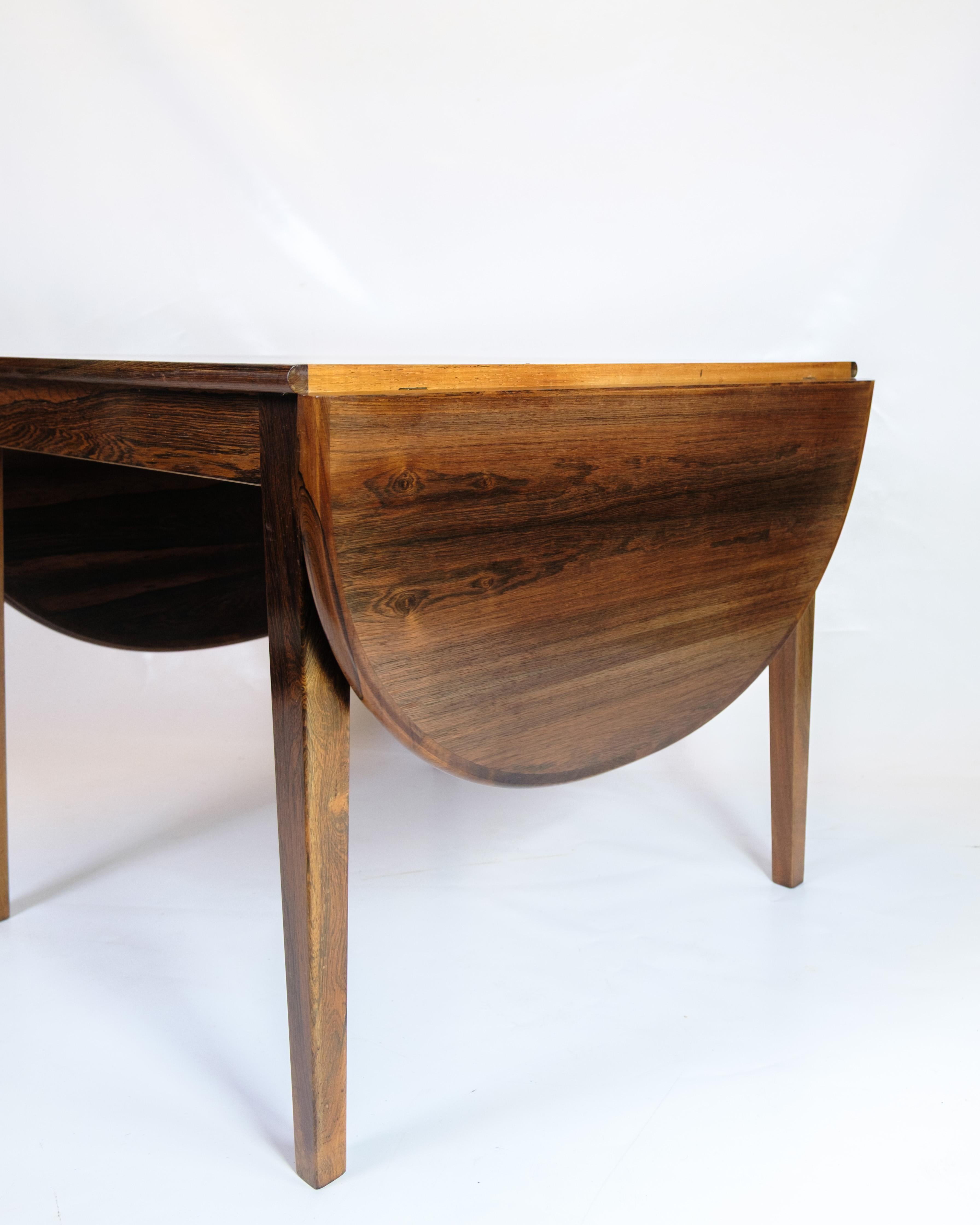 Mid-Century Modern Dining Table With Flaps Made In Rosewood, Danish Design From 1960s For Sale