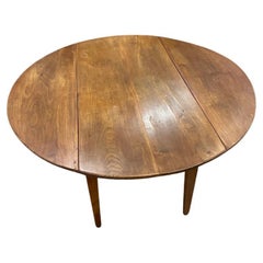 Dining Table with Folding Wings
