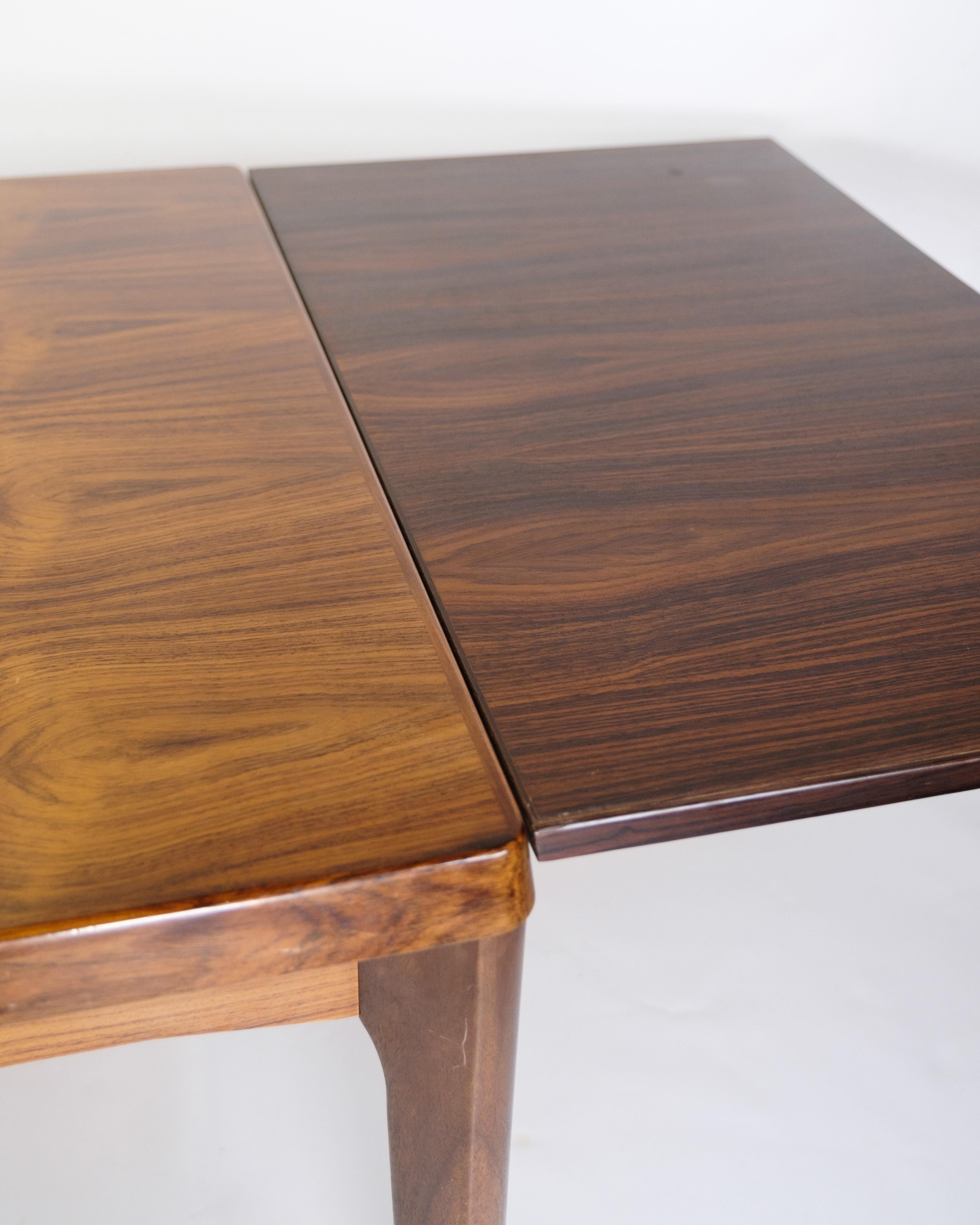 Mesa de comedor extraíble de madera de palisandro por Henning Kjærnulf De los años 60 en venta 2