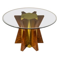 Tavolo da pranzo con piano rotondo in vetro attribuito a Tommaso Barbi, Italia anni '70