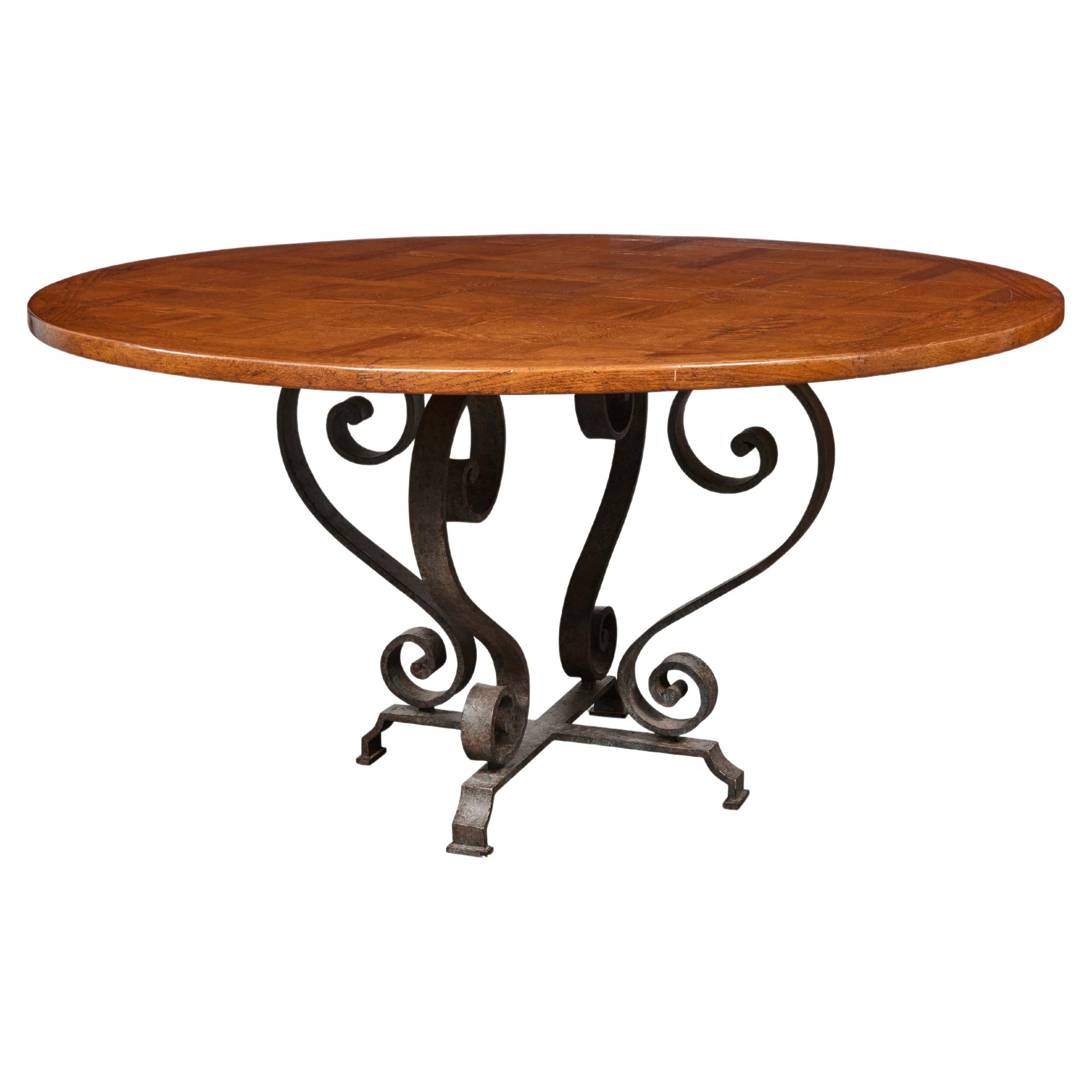 Dining Table with Round Mahogany Top and Wrought Iron Base For Sale