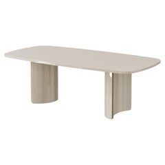 Tavolo da pranzo con base a piedistallo scultorea con finiture laccate opache o lucide