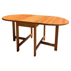 Dining Table with Two Drop-Down Leaves