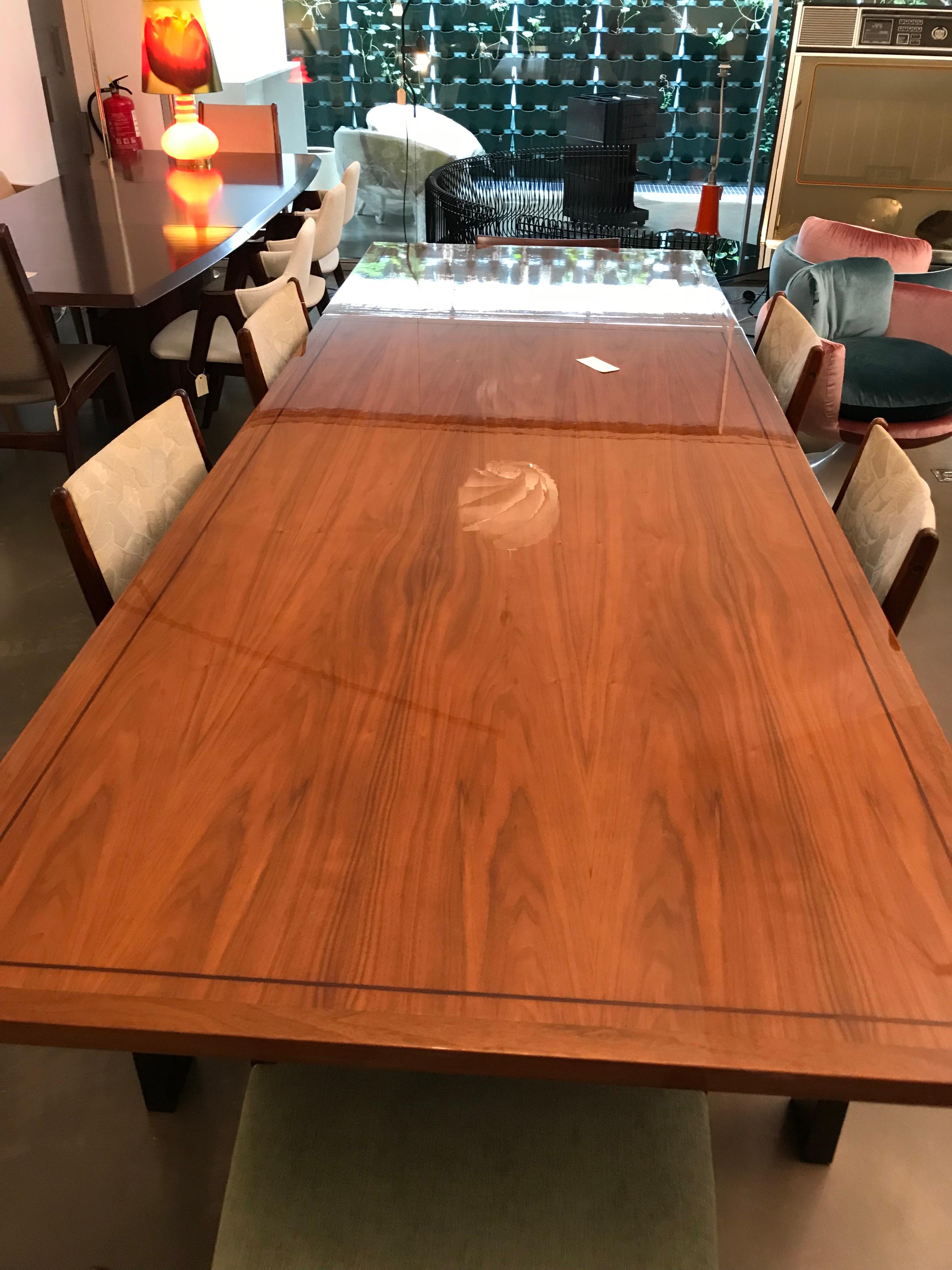 Dining table with walnut root tabletop and black lacquered steel structure
Early 20th century walnut dining table
The four legs black lacquered steel structure contrasts with the walnut top which is a natural lighter toned finish. The top slides
