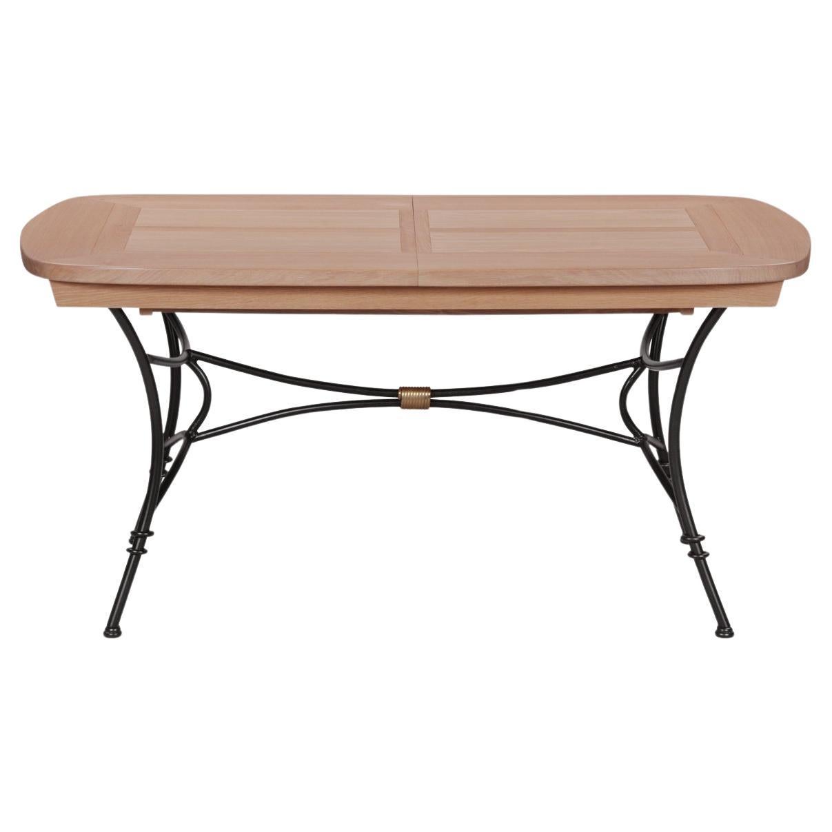 Wrought-iron table with solid oak top and extensions
