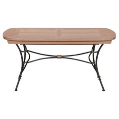Wrought-iron table with solid oak top and extensions