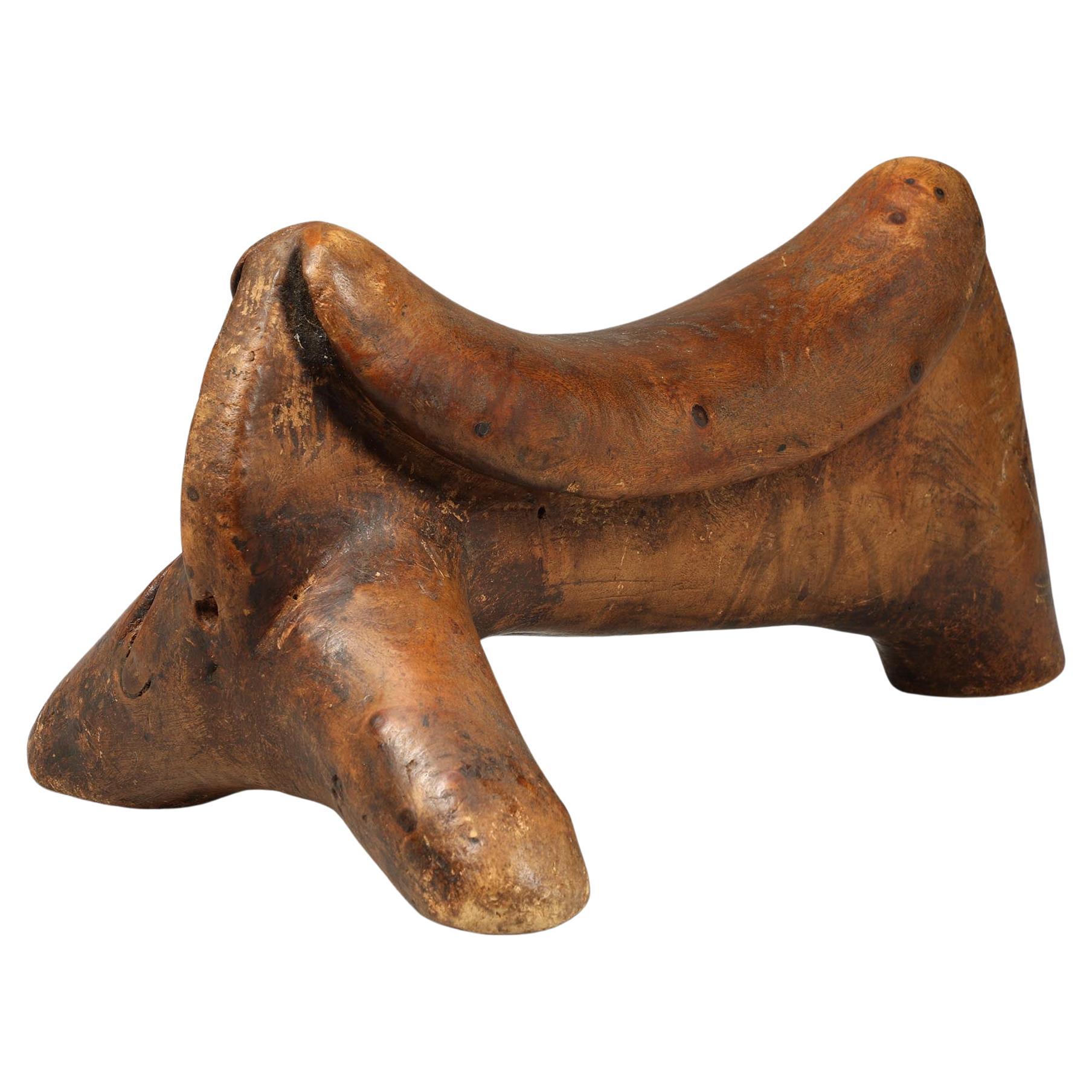 Dinka stylized animal form carved wood headrest, East Africa For Sale