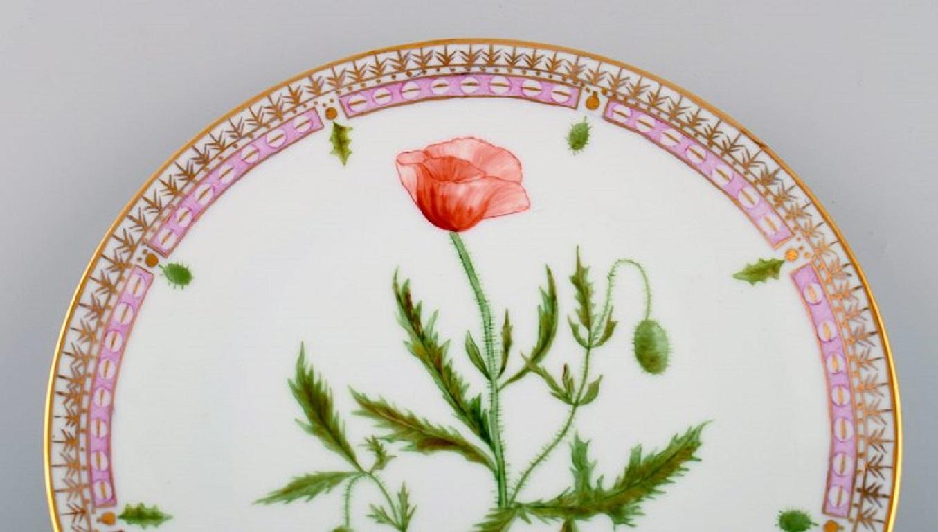 Dinner plate in Flora Danica style. Hand-painted flowers and gold decoration. Mid-20th century.
Diameter: 24.6 cm.
In excellent condition.
Signed.