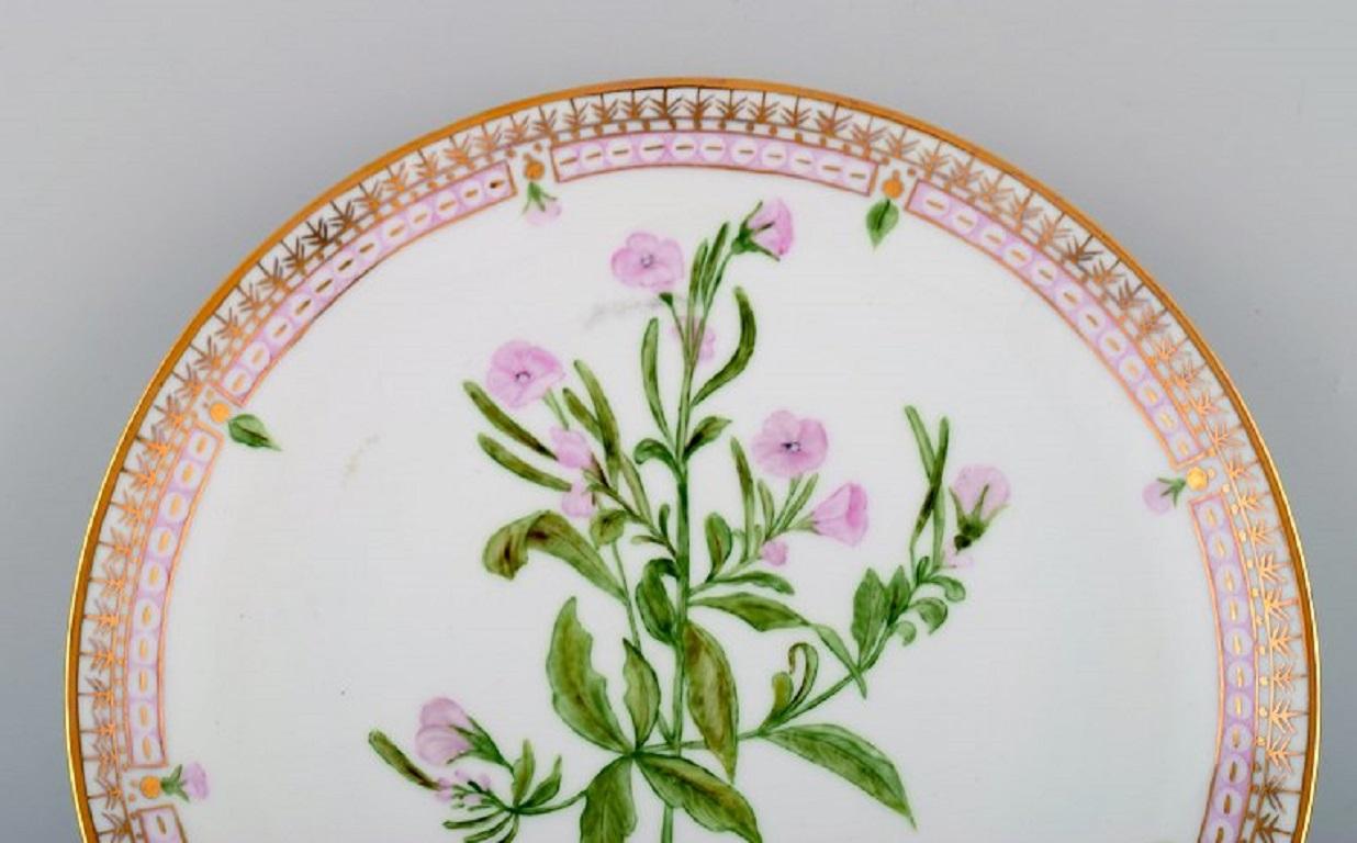 Dinner plate in Flora Danica style. Hand-painted flowers and gold decoration. Mid-20th century.
Diameter: 24.5 cm.
In excellent condition.
Signed.