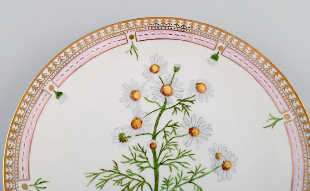 Dinner plate in Flora Danica style. Hand-painted flowers and gold decoration. Mid-20th century.
Diameter: 24.5 cm.
In excellent condition.
Signed.