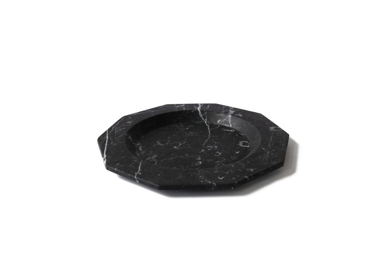 Dinner plate in satin black Marquina marble.

Available also in white Carrara or red Levanto and white Carrara marble.

Each piece is in a way unique (every marble block is different in veins and shades) and handmade by Italian artisans