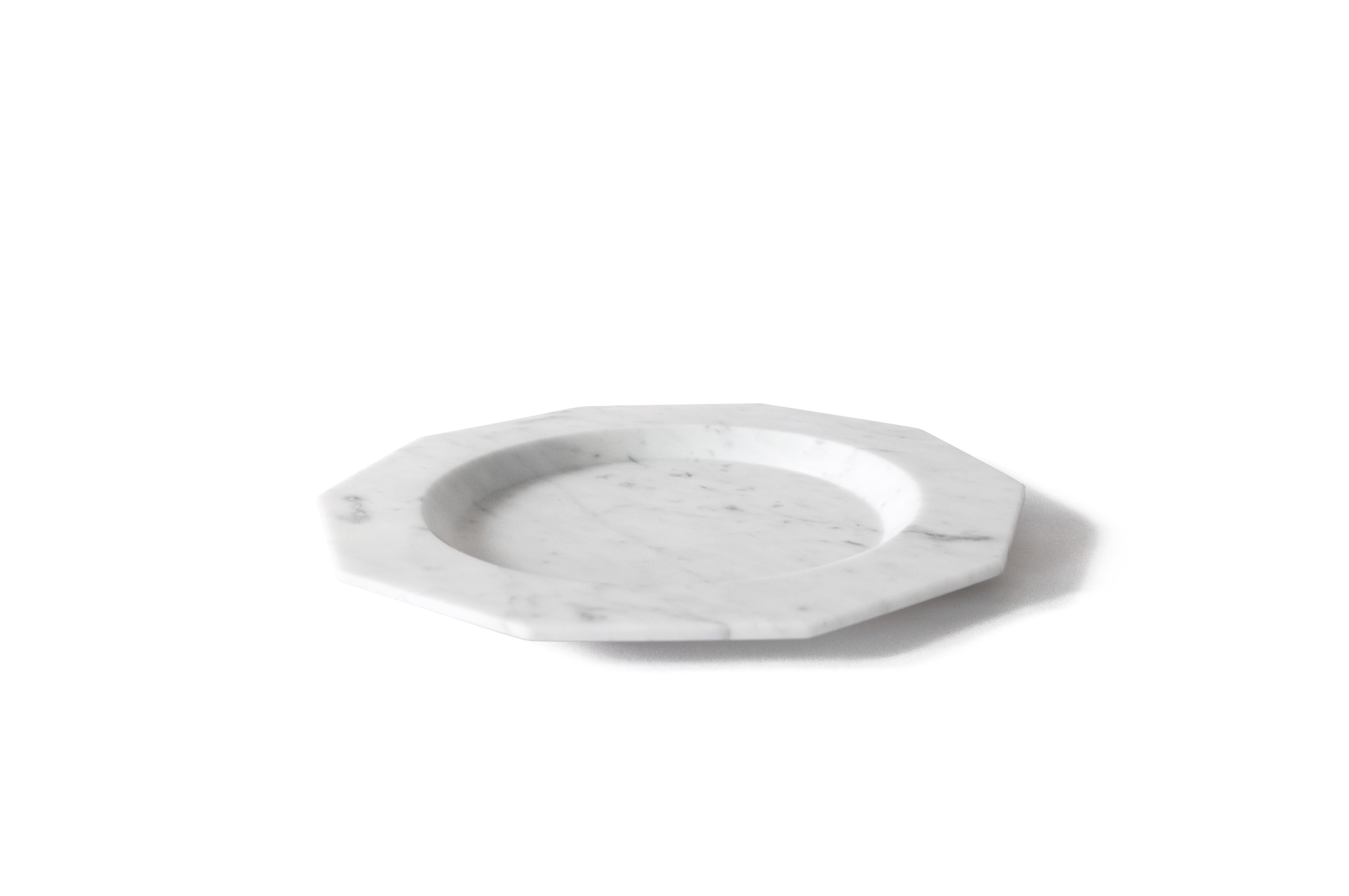 Dinner plate in satin white Carrara marble.

Available also in black Marquina or red Levanto and white Carrara marble.

Each piece is in a way unique (every marble block is different in veins and shades) and handmade by Italian artisans