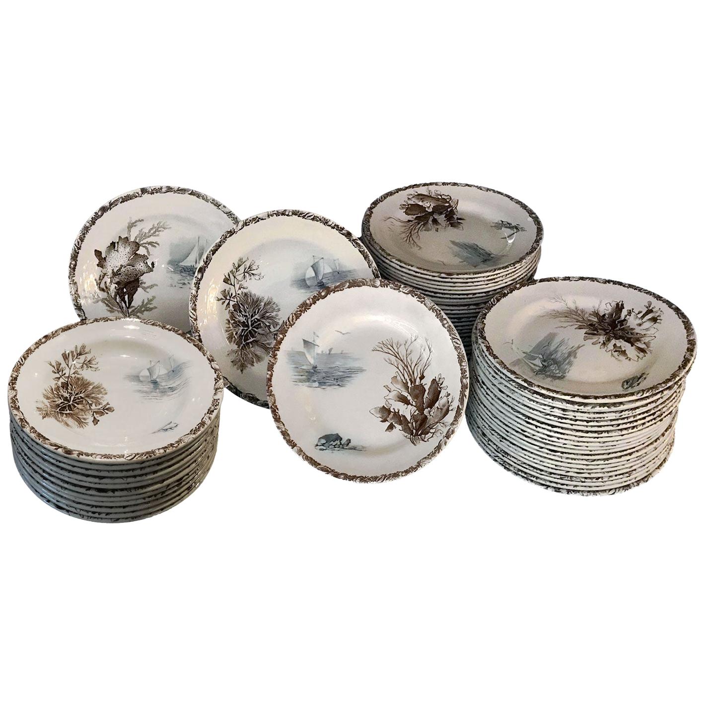 These plates by the French faience Manufacture of Choisy-le-Roi are decorated with several different interesting sepia and blue prints of algae and sailfishes are on the plates. This set is perfect for sea or sailfish lovers!
You will enjoy the sea