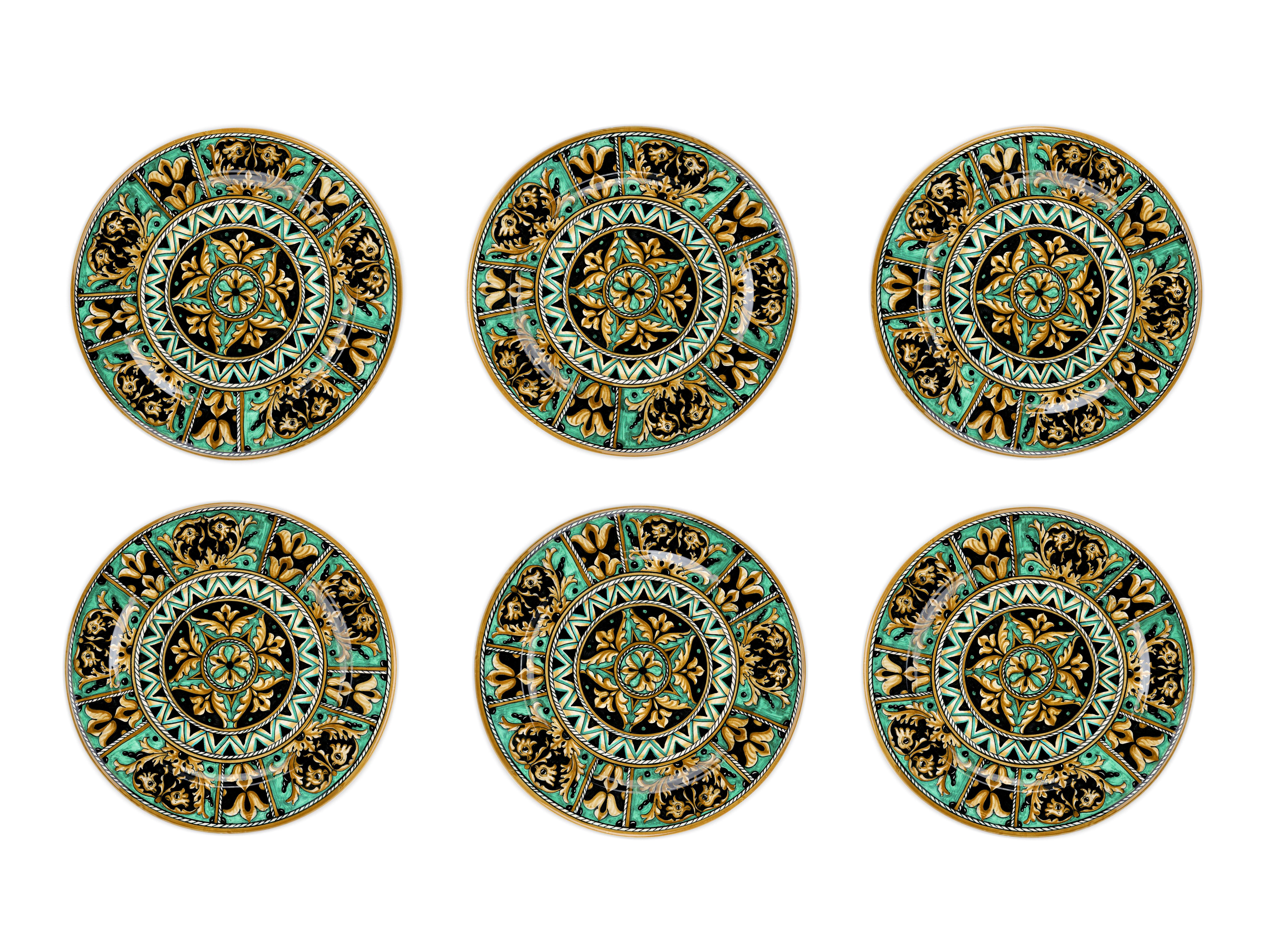 This exclusive set of six plates, in majolica painted in polychrome, reinterprets the 
