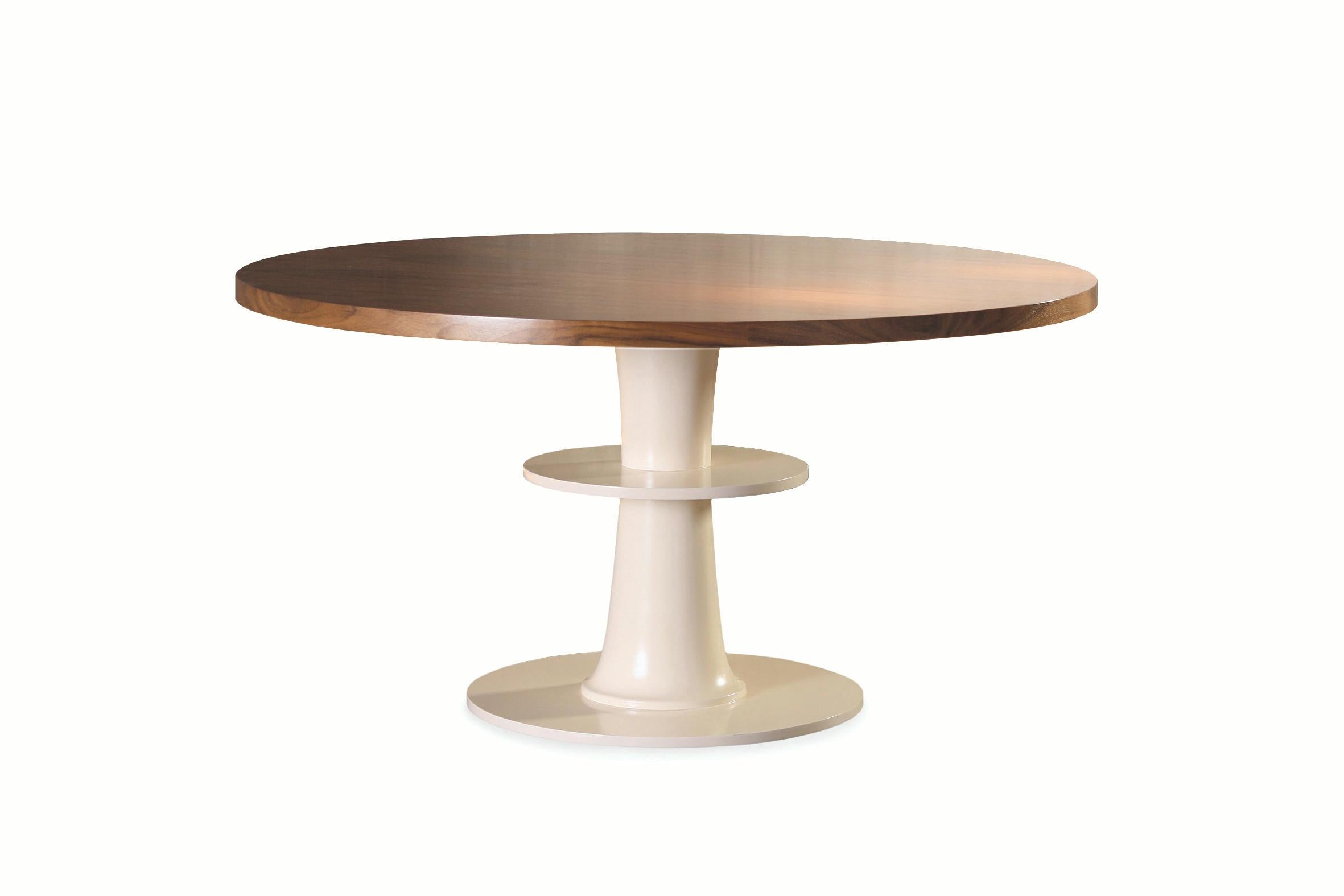 Circule dinner table is a practical and fun round table made of plywood, decape or lacquered mdf top and a lacquered mdf bottom, possible to customize in many colors. The middle part support allows the user to store a handbag or other items while