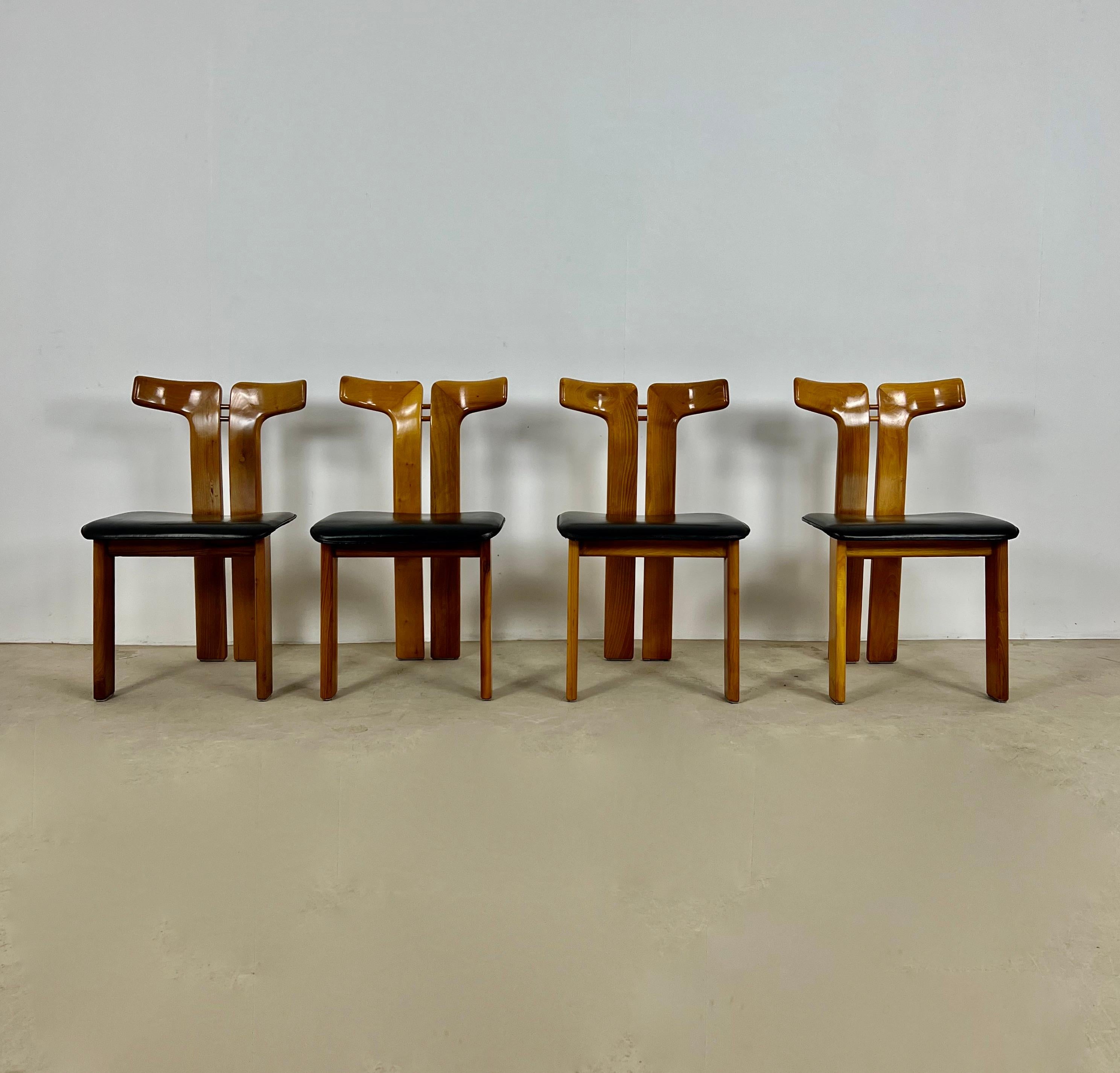 Set of 4 leather and wood chairs by Pierre Cardin Italy 1980s. Seat height: 44cm. Wear due to time and age of the chairs.