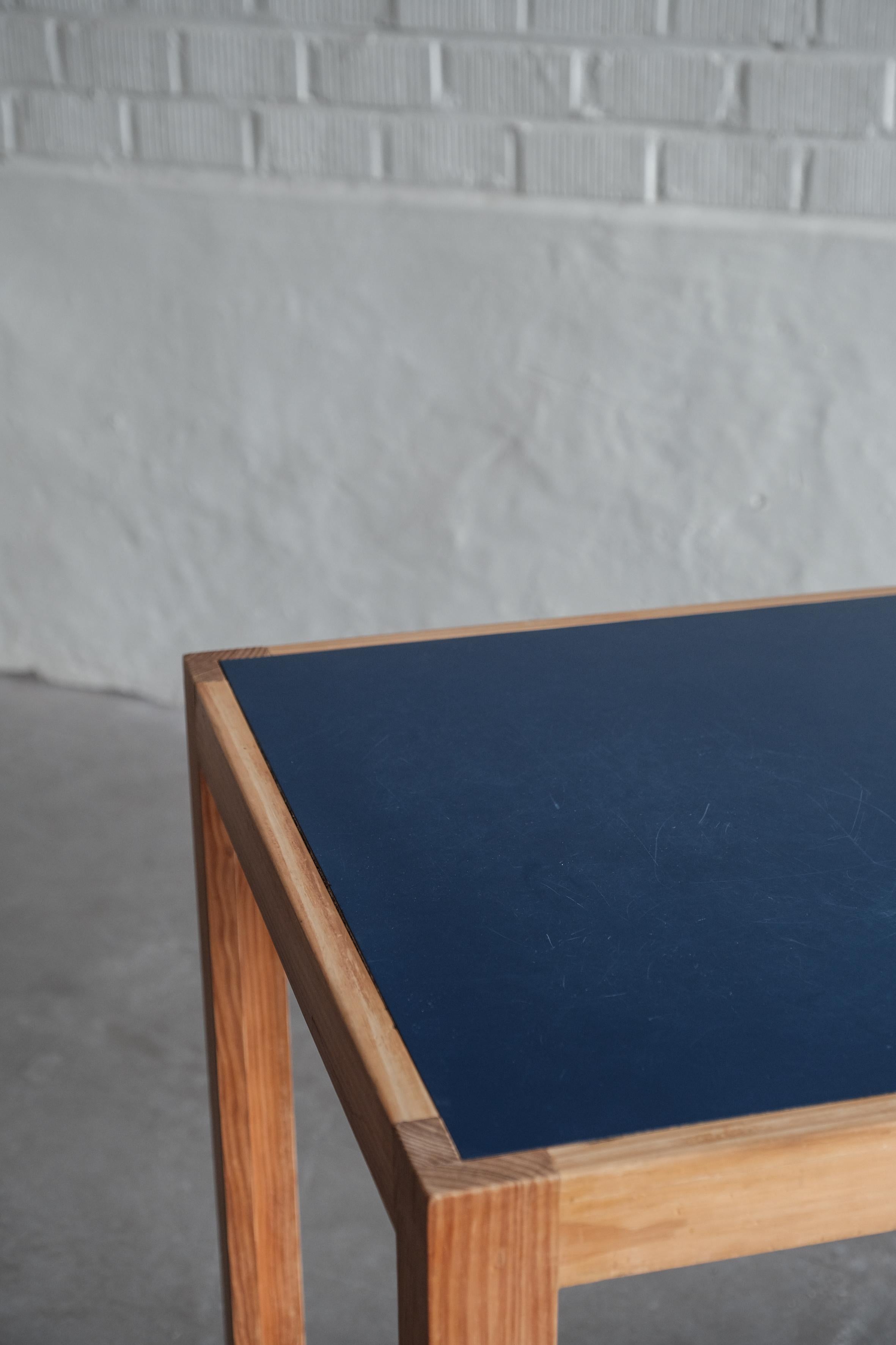 Dinning set with blue formica table top and leather seating 3