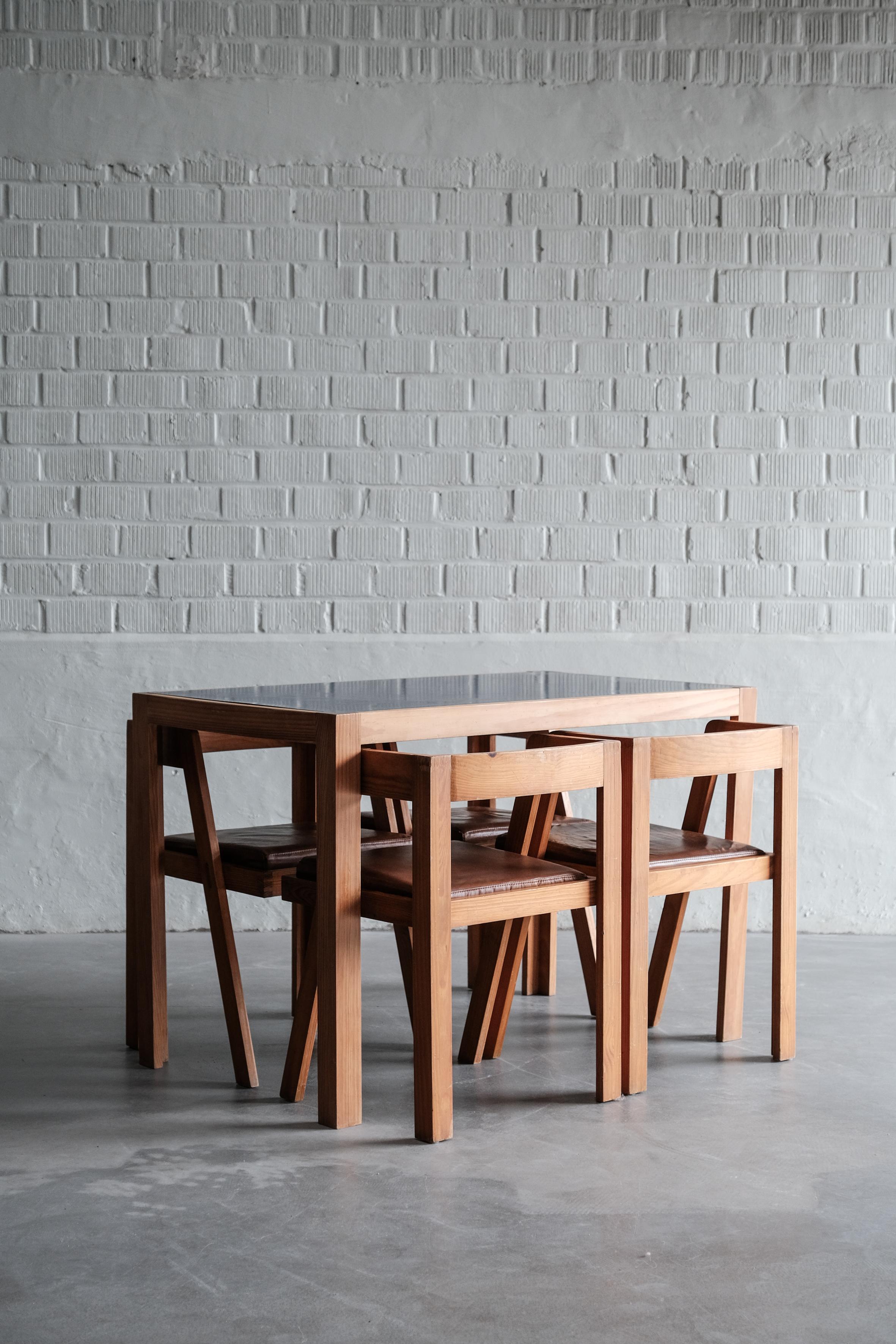 Dinning set with blue formica table top and leather seating 1