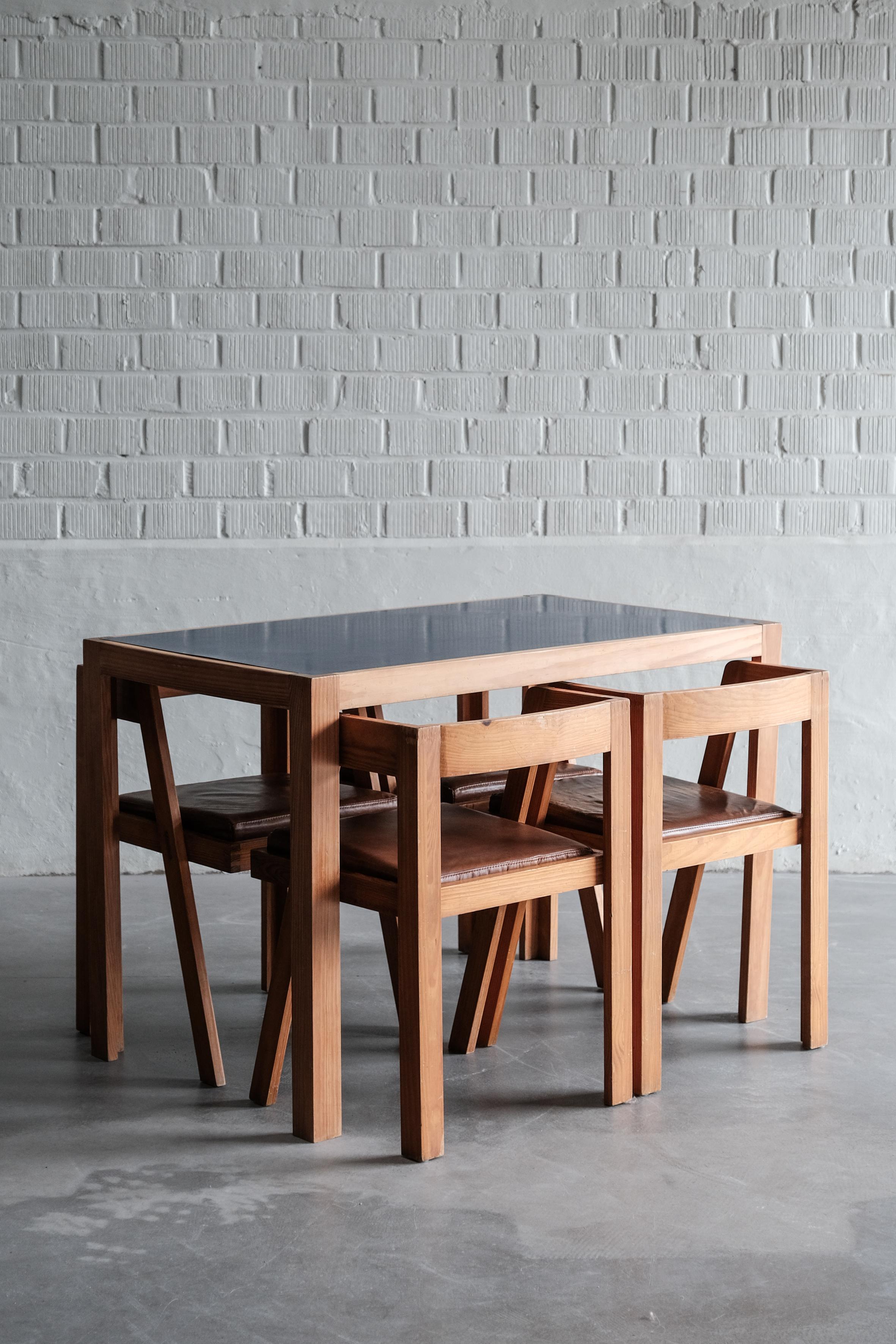 Dinning set with blue formica table top and leather seating 2