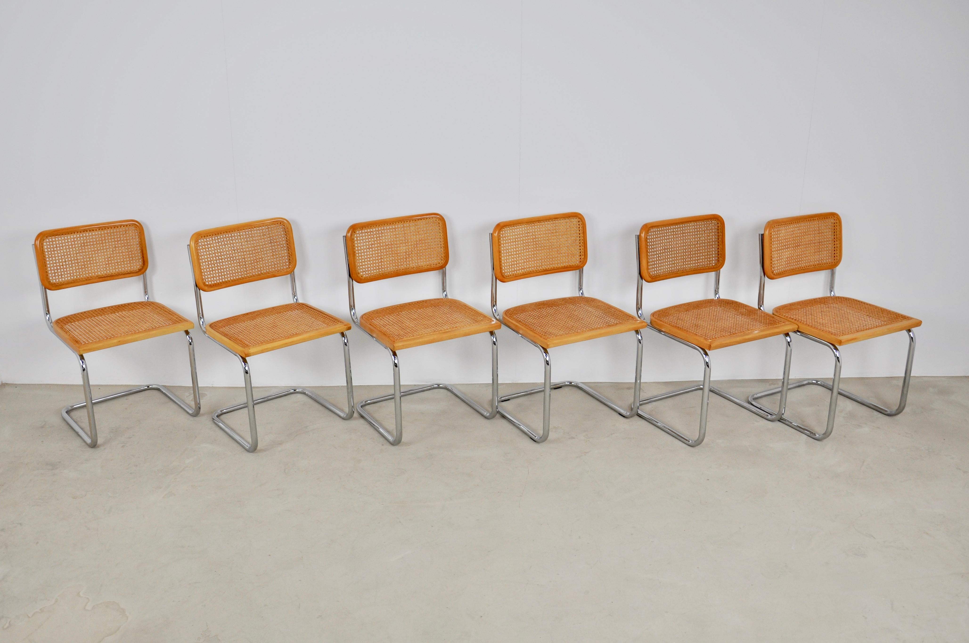 Set of 6 chairs in canagemetal wood. Slight wear due to the time and the age of the chairs. Measure: Seat height 45cm.