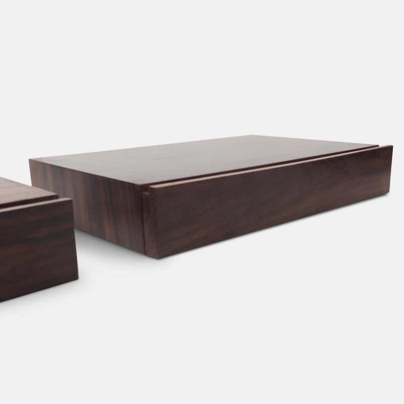 A fabulous pair of Dino Cavalli minimilast floating nightstands.