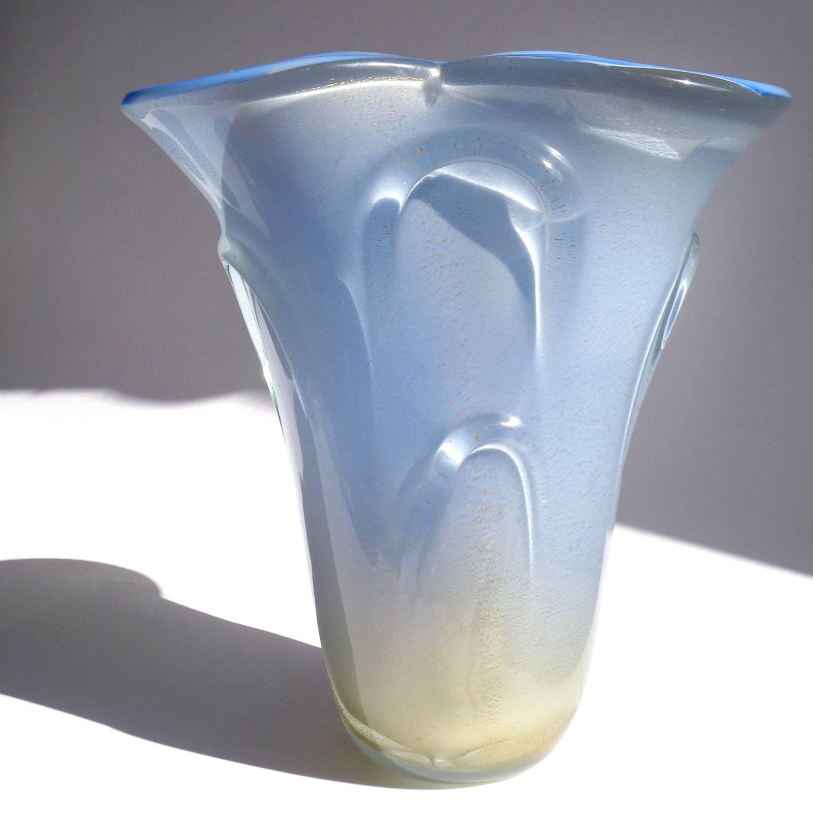 Gorgeous and large, vintage Murano hand blown light sky blue and gold flecks Italian art glass sculptural flower vase. Documented to designer Dino Martens for Aureliano Toso. The vase has a fan shaped rim with pulled glass decorative design around
