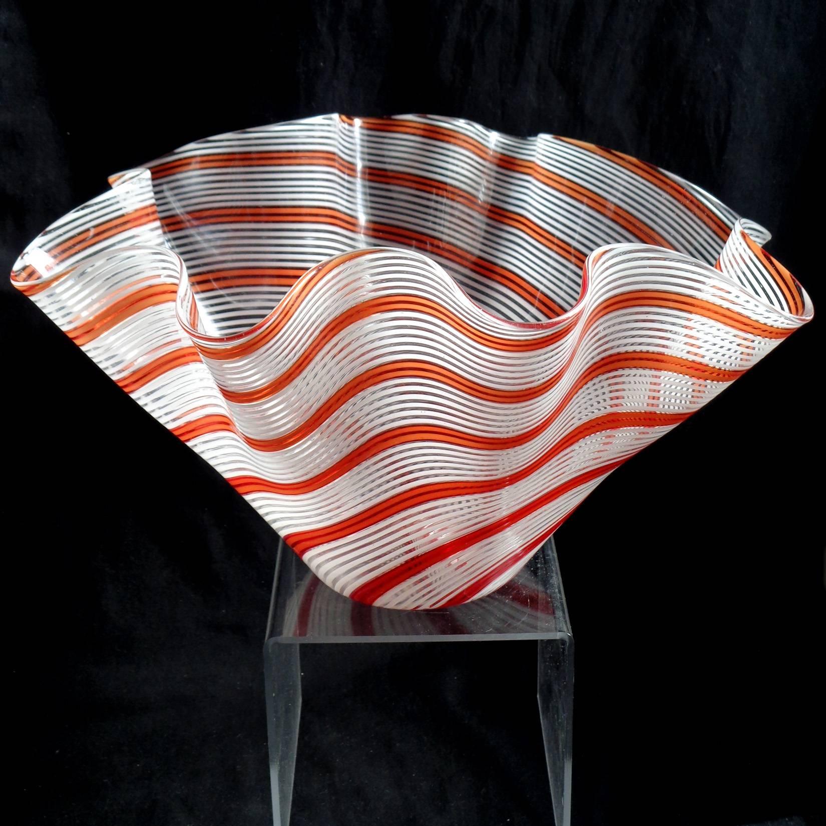 Amazing, large Murano hand blown red orange and white filigrana ribbons Italian art glass fazzoletto flower vase. Documented to designer Dino Martens for Aureliano Toso. Great centerpiece for your table, filled with flowers or as a sculptural