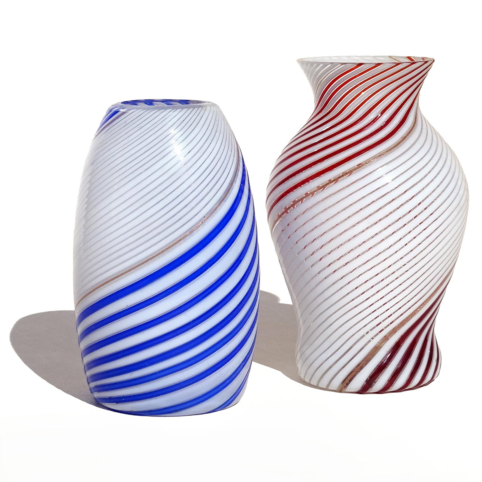Beautiful pair of vintage Murano hand blown white, red and cobalt blue ribbons Italian art glass flower vases. Documented to designer Dino Martens for Aureliano Toso. They have a ribbon of glittery copper aventurine dividing the colors. Published.