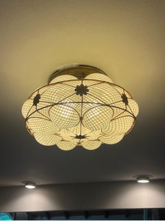 Lampadario Reticello in vetro artistico di Murano e gabbia in bronzo di Dino Martens