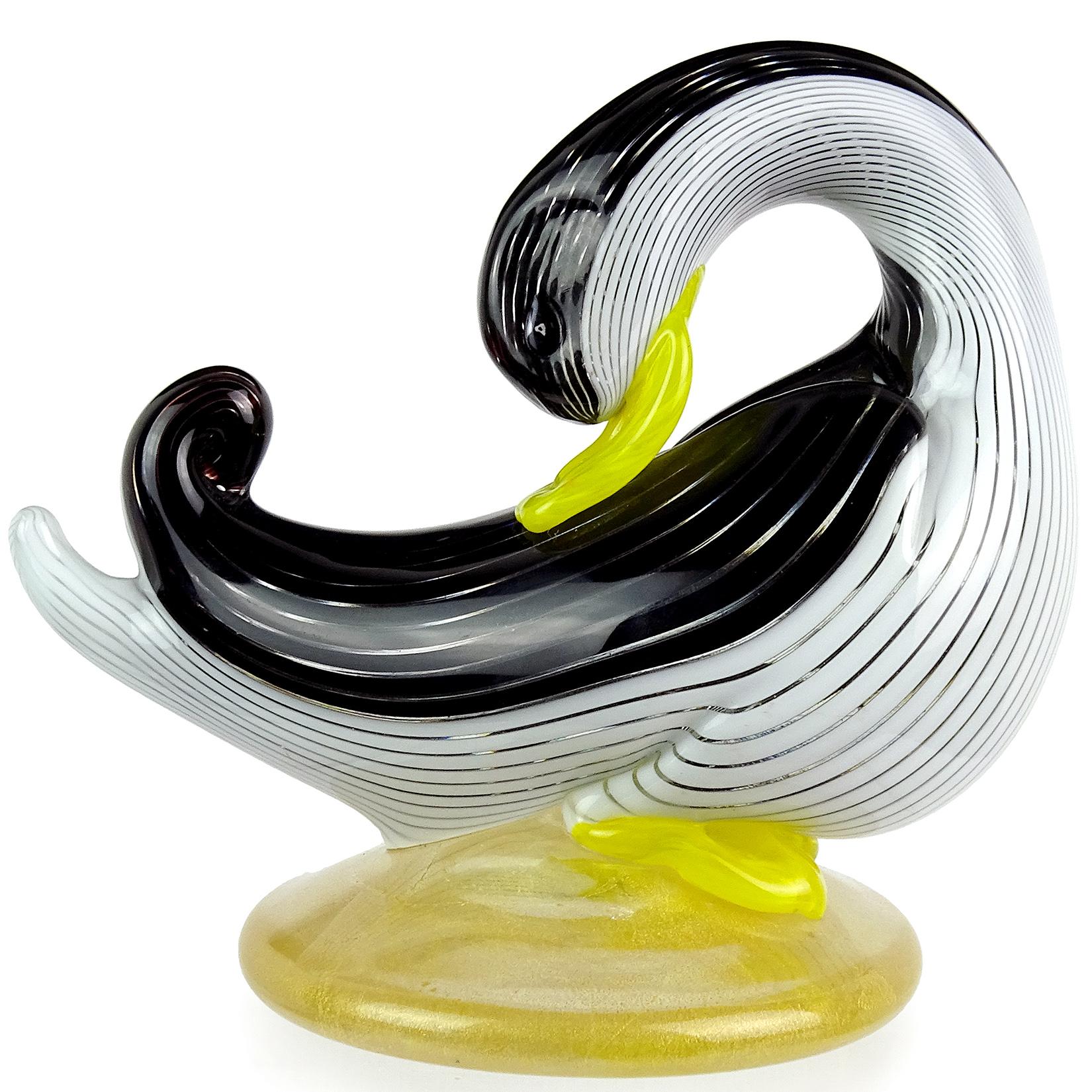 Beautiful Murano handblown black and white ribbons Italian art glass duck sculpture on gold base. Documented to designer Dino Martens for Aureliano Toso, and published in his book (see last photo), circa 1954. Model number 5902, in 