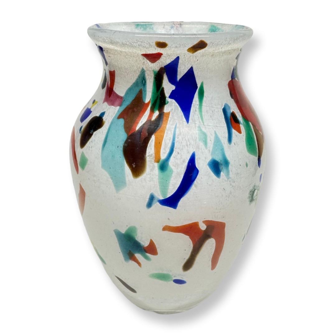 This designer Murano glass vase is an iconic masterpiece by the legendary artist Dino Martens (1894–1970), created for the renowned Aureliano Toso glassworks. While unsigned, this model is widely recognized among collectors and enthusiasts and is