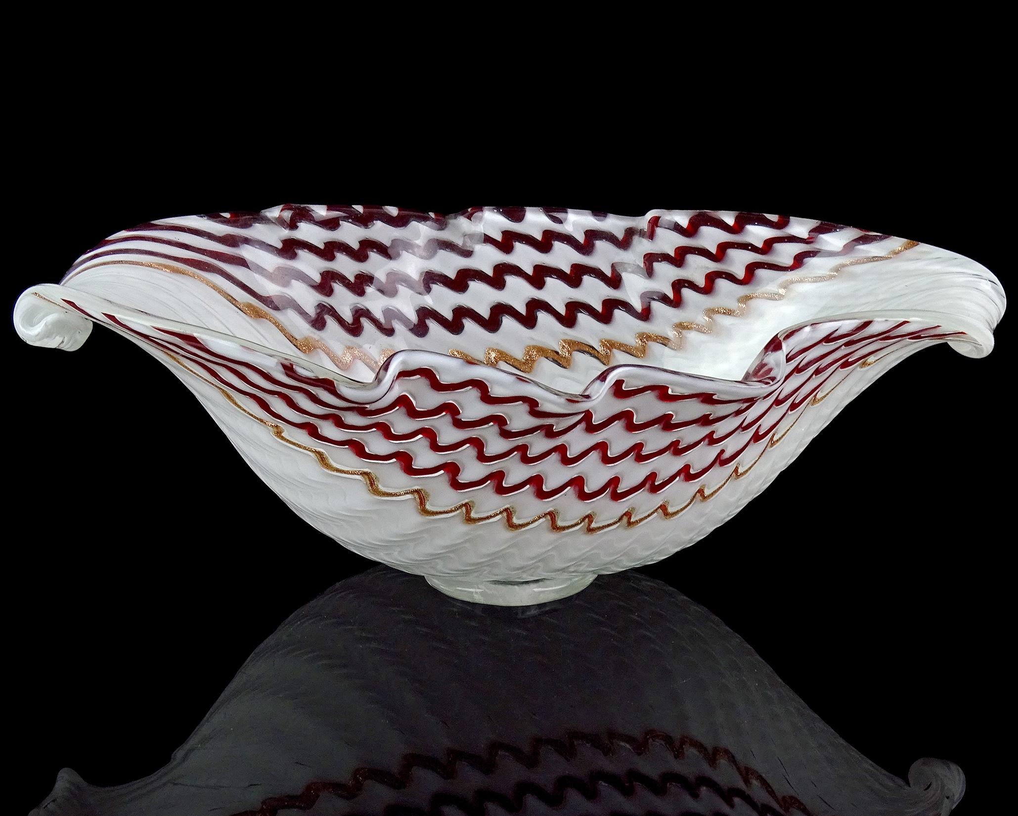 Beautiful vintage Murano hand blown white, red and copper aventurine Italian art glass centerpiece footed bowl. Documented to designer Dino Martens for Aureliano Toso, circa 1950s. Similars are published in his book (see last photo). Looks to be a