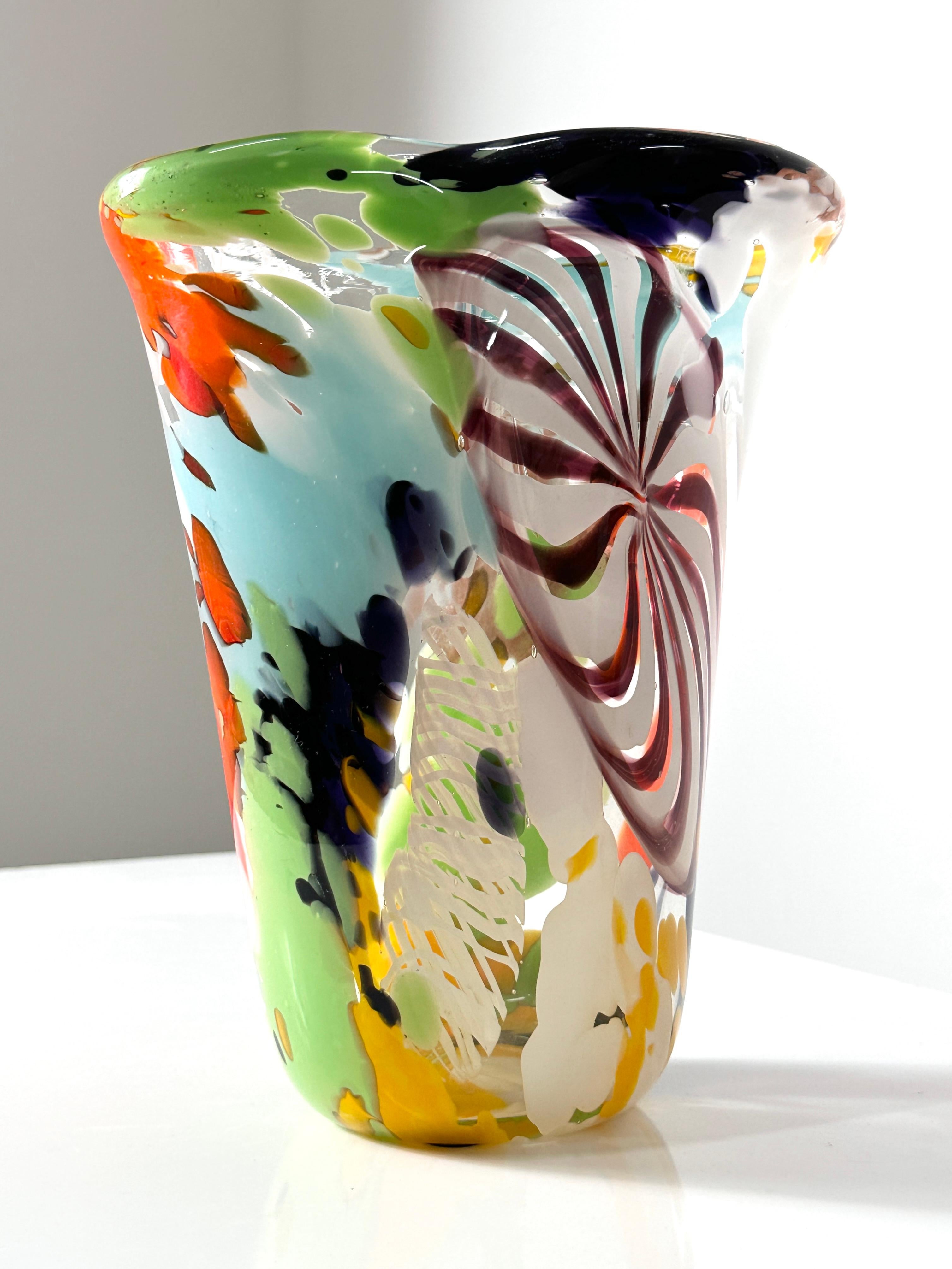 Oriente vase designed by Dino Martens for Aureliano Toso circa 1970s-80s
Cased glass with bold and colorful interior patchwork
Sprinkled copper aventurina and signature abstract pinwheel