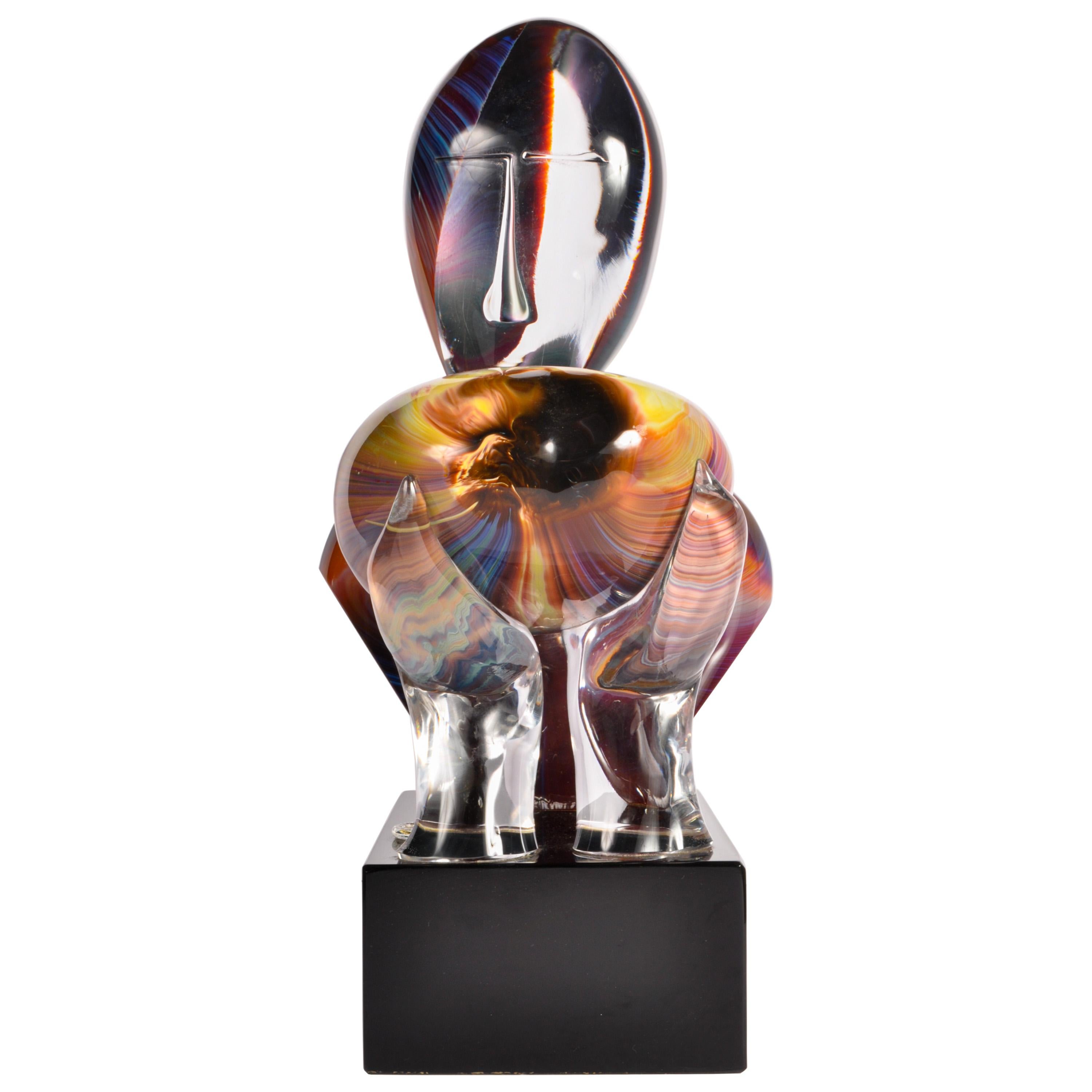 A modern Italian sculpture made entirely by hand in the furnace on the island of Murano, by celebrated glass master Dino Rosin (Italian b. 1948), with glass techniques in solid, crystal and chalcedony glass (Italian glass technique fusing colored,