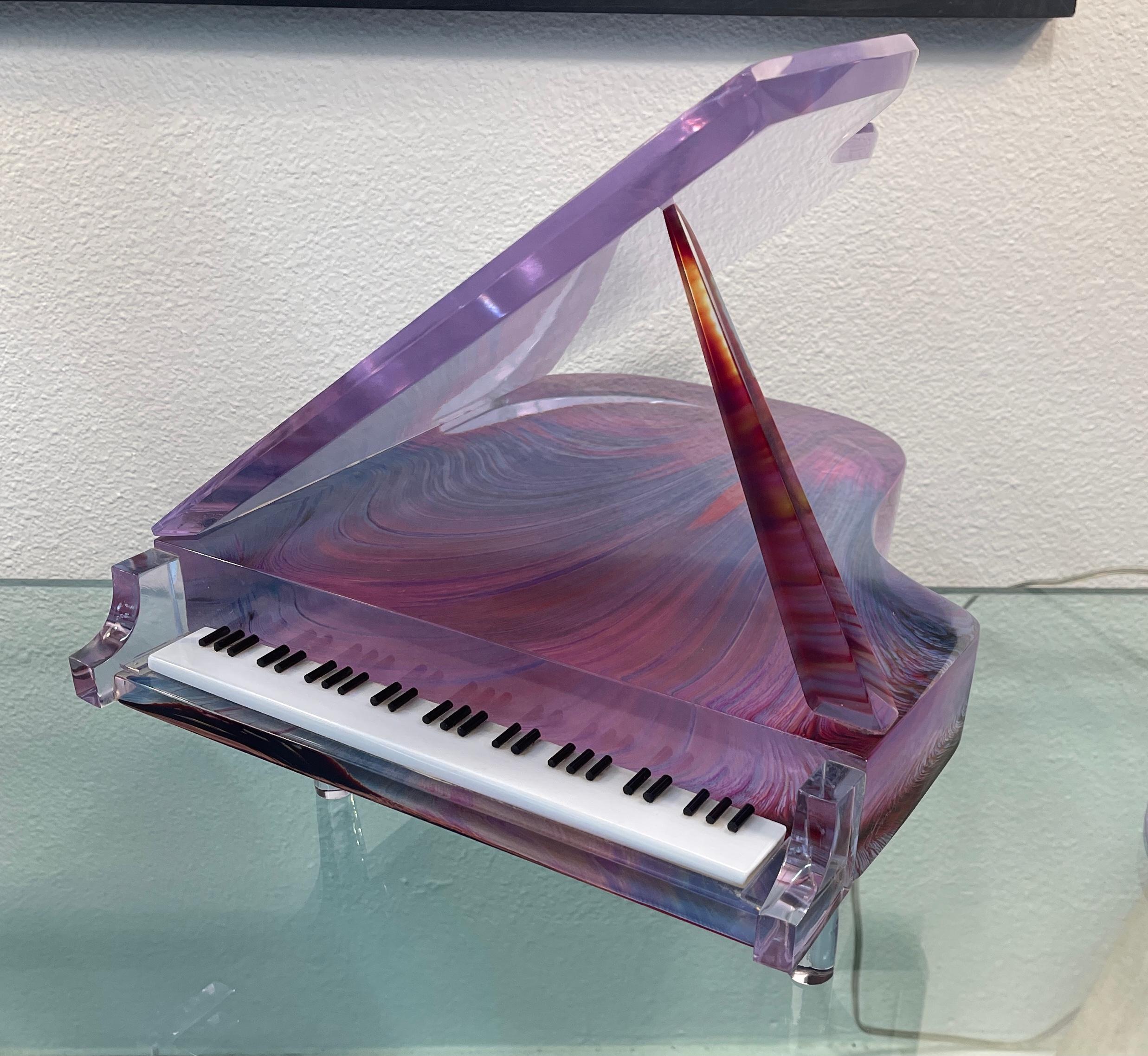 Wonderful large art glass piano by the Italian Master Dino Rosin. Crafted out of Chalcedony or Chalcedonio glass and inscribed Made for Ann Taylor, Dino Rosin. We're not sure if this was for the corporate Ann Taylor or an individual. Out of a Palm