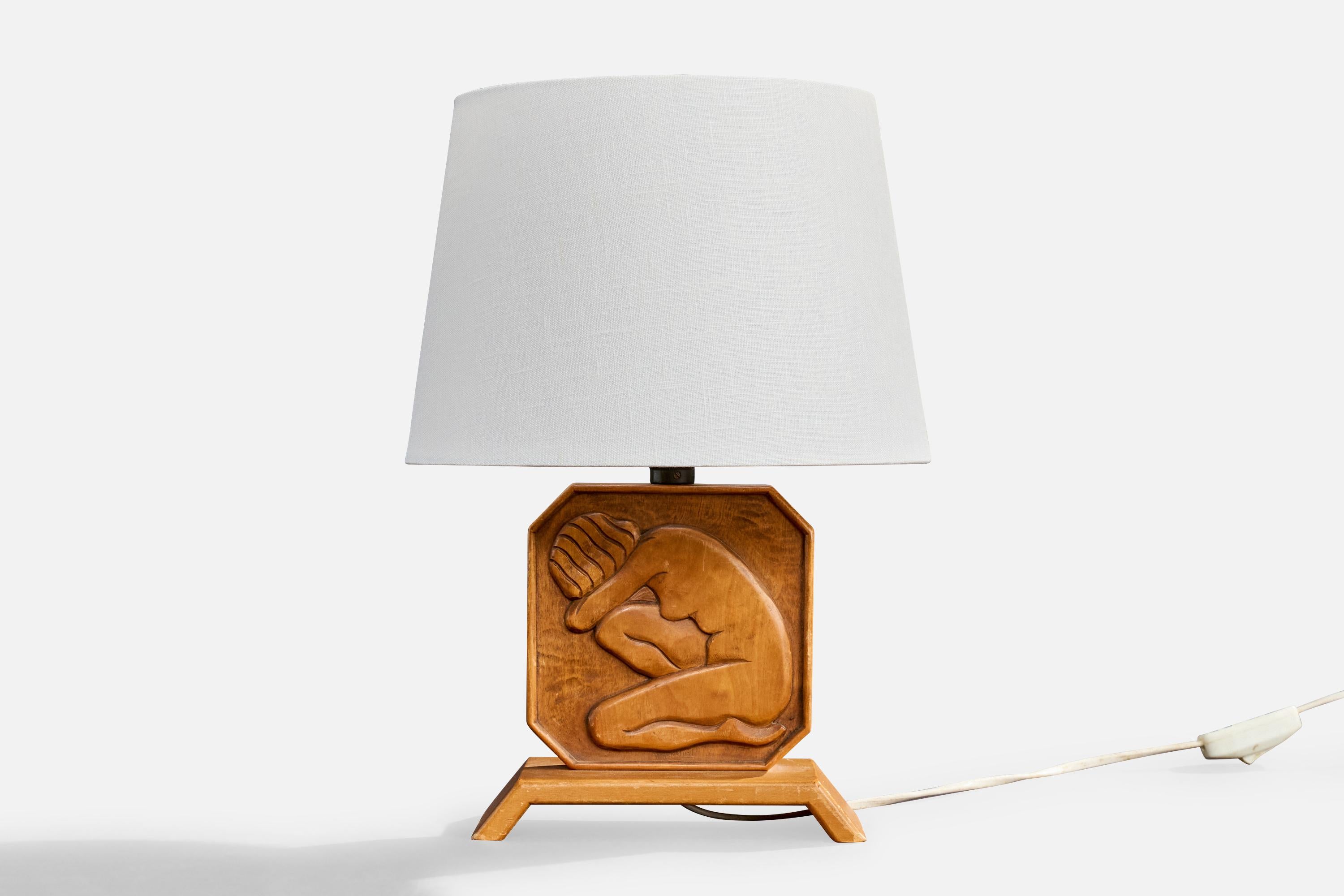 Lampe de table en bois produite par Diö Slöjd, Suède, c. 1940s.

Dimensions de la lampe (pouces) : 9.25 