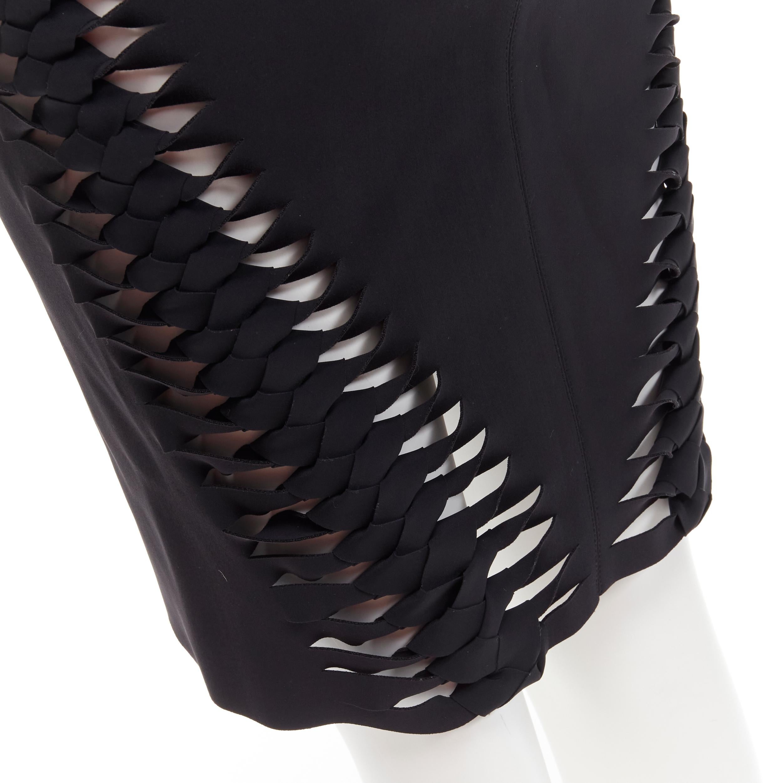 DION LEE black cut out braid knot detail pencil skirt AUS8 US4 S
Brand: Dion Lee
Material: Polyester
Color: Black
Pattern: Solid
Closure: Zip
Extra Detail: Braid detailing at back.
Made in: Australia

CONDITION:
Condition: Excellent, this item was