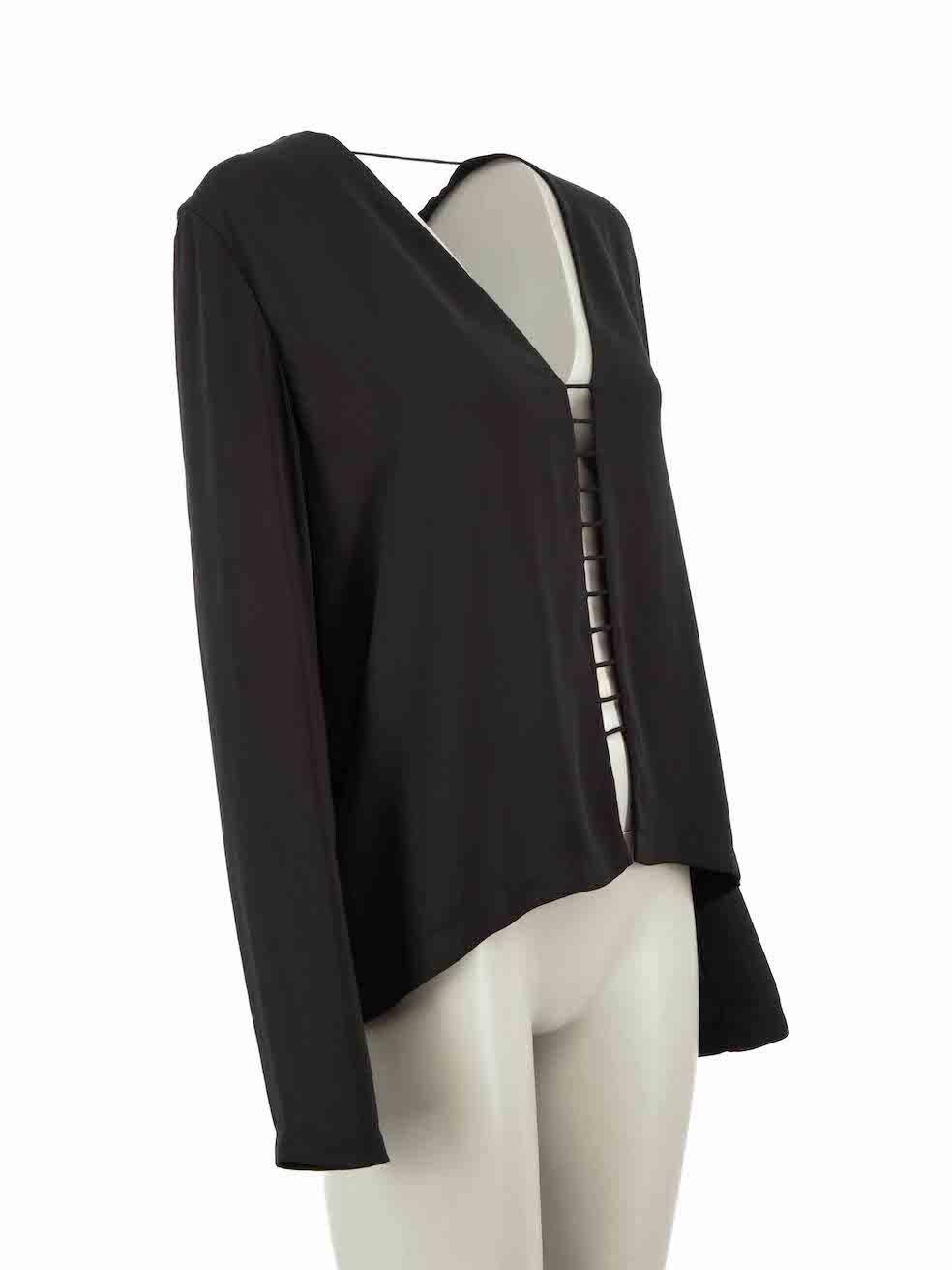 CONDITION is Very good. Hardly any visible wear to blouse is evident on this used Dion Lee designer resale item.
 
Details
Black
Polyester
Blouse
Long sleeves
Round neck
Open back
Back ladder detail
Button up fastening

Made in China
