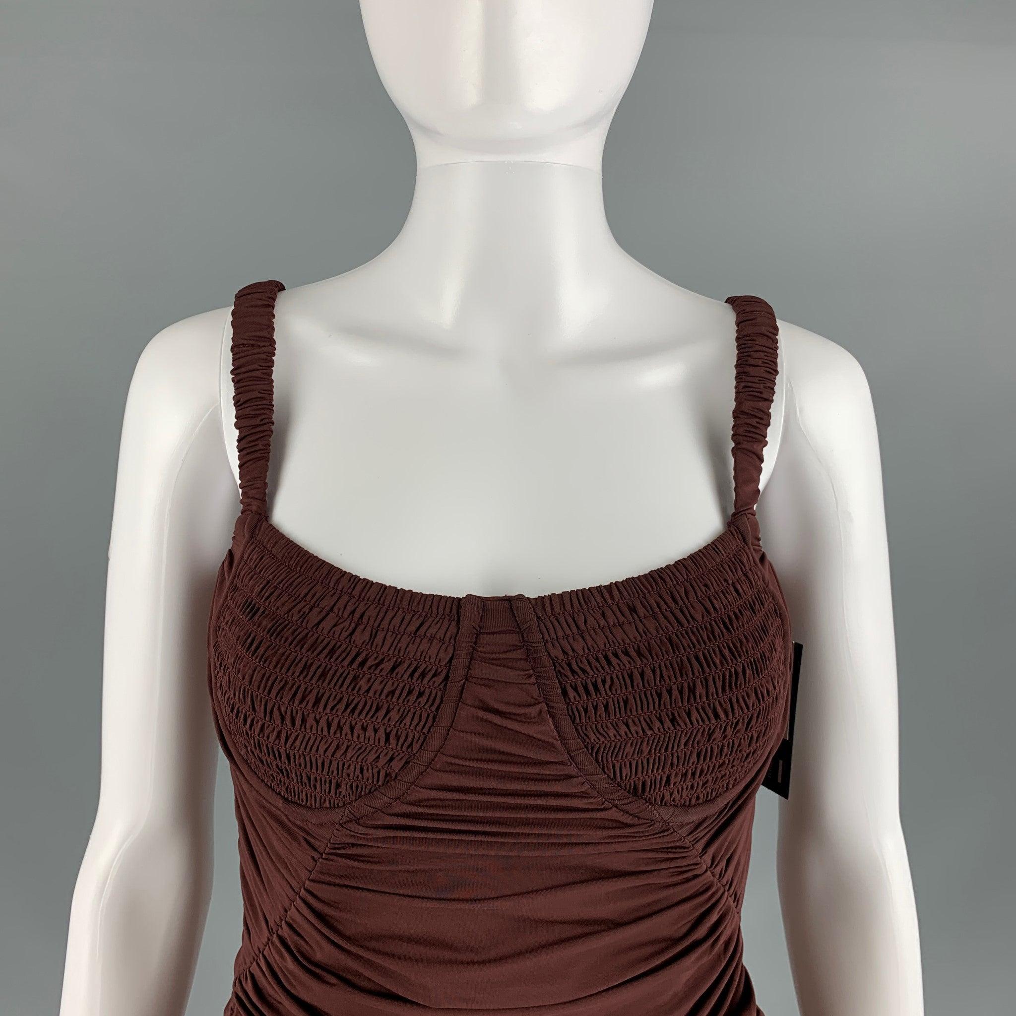 DION LEE cocktail dress comes in burgundy viscose knit material featuring corset dress design, ruched detail, adjustable drawstring, side zip up closure, and spaghetti strap.New with Tags. 

Marked:  8 

Measurements: 
 Bust: 30 inWaist: 26 inHip: