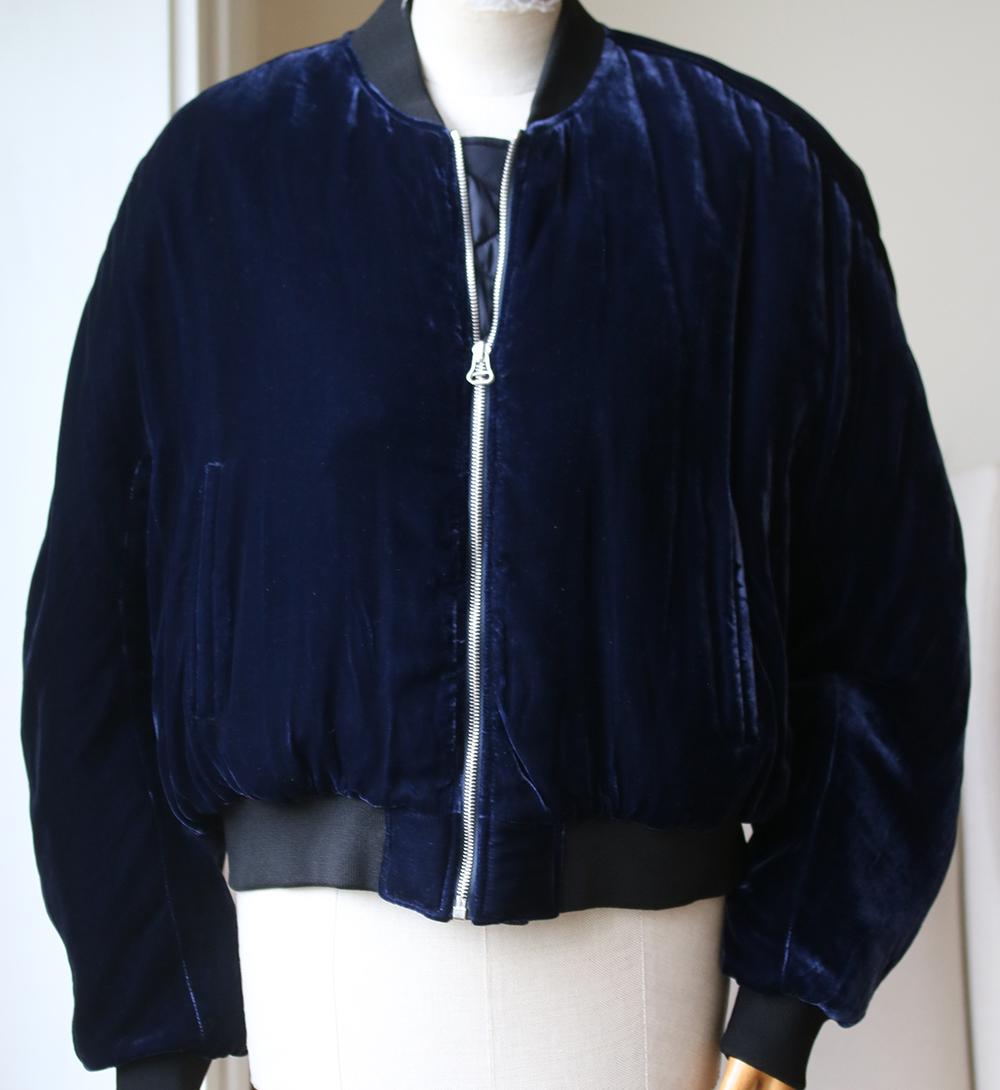 Dion Lee has chosen plush midnight-blue velvet to create this bomber jacket, and it gives the classic style a fresh, sophisticated feel. This piece is woven with touches of silk for a lustrous soft handle and defined by black ribbed trims.