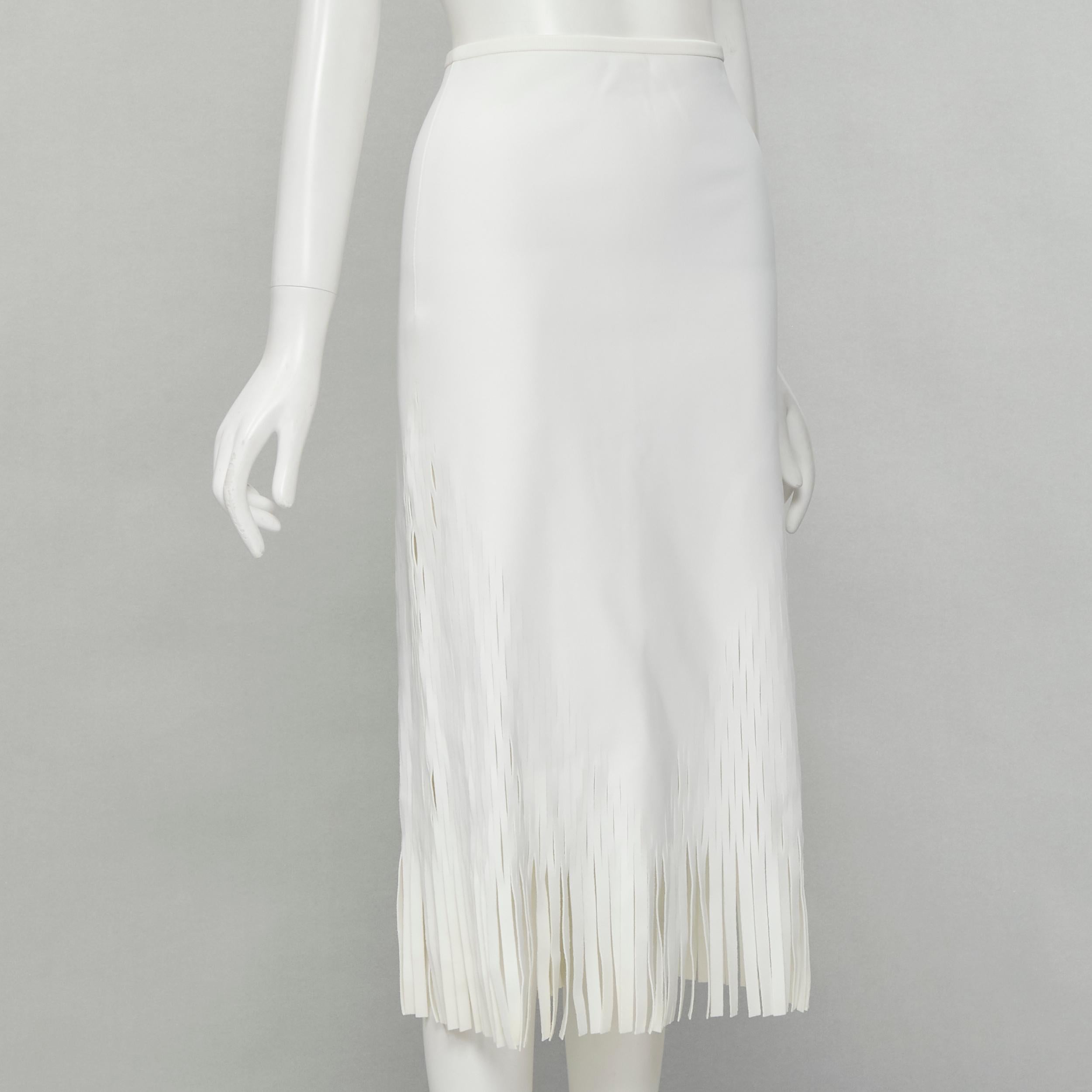 DION LEE white honeycomb cut out fringe hem midi skirt AUS 6 US2 XS
Brand: Dion Lee
Material: Polyester
Color: White
Pattern: Solid
Closure: Half Zip
Made in: Australia

CONDITION:
Condition: Excellent, this item was pre-owned and is in excellent