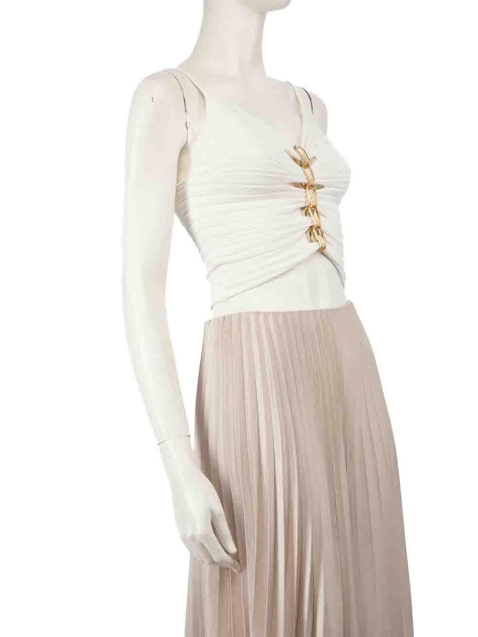 CONDITION is Very good. Minimal wear to top is evident. Minimal tarnishing to third chain hardware on this used Dion Lee designer resale item.
 
 
 
 Details
 
 
 White
 
 Viscose
 
 Top
 
 Sleeveless
 
 Front chain detail
 
 Cropped fit
 
 
 
 
 
