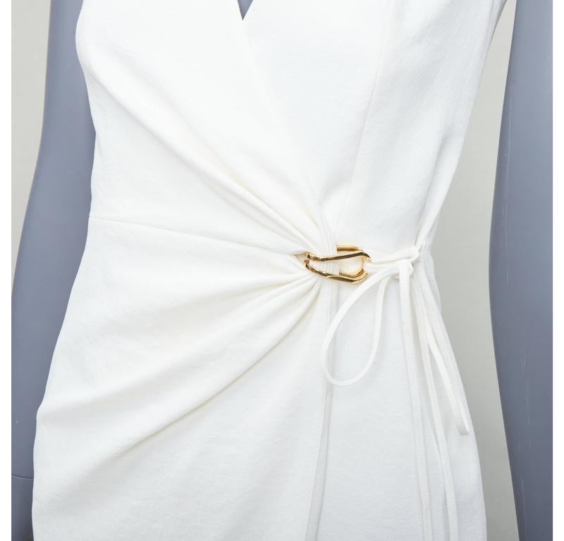 DION LEE vestido cruzado blanco con textura y detalles dorados UK6 XS
Referencia: YIKK/A00178
Marca: Dion Lee
Material: Poliéster
Color: blanco, dorado
Patrón: Sólido
Cierre: Lazo envolvente
Forro: Tejido blanco
Detalles adicionales: Vestido midi de