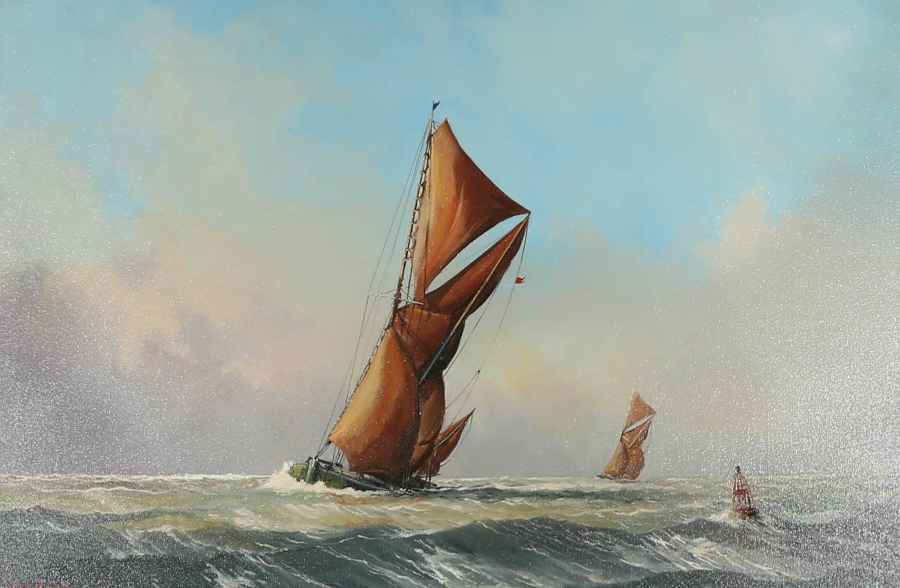 This charming nautical scene depicts Thames Barges battling choppy waves at sea. The artist shows a storm cloud encroaching on a clear blue sky making for a delightfully dramatic scene. Signed to the lower left. Part of a pair of paintings depicting