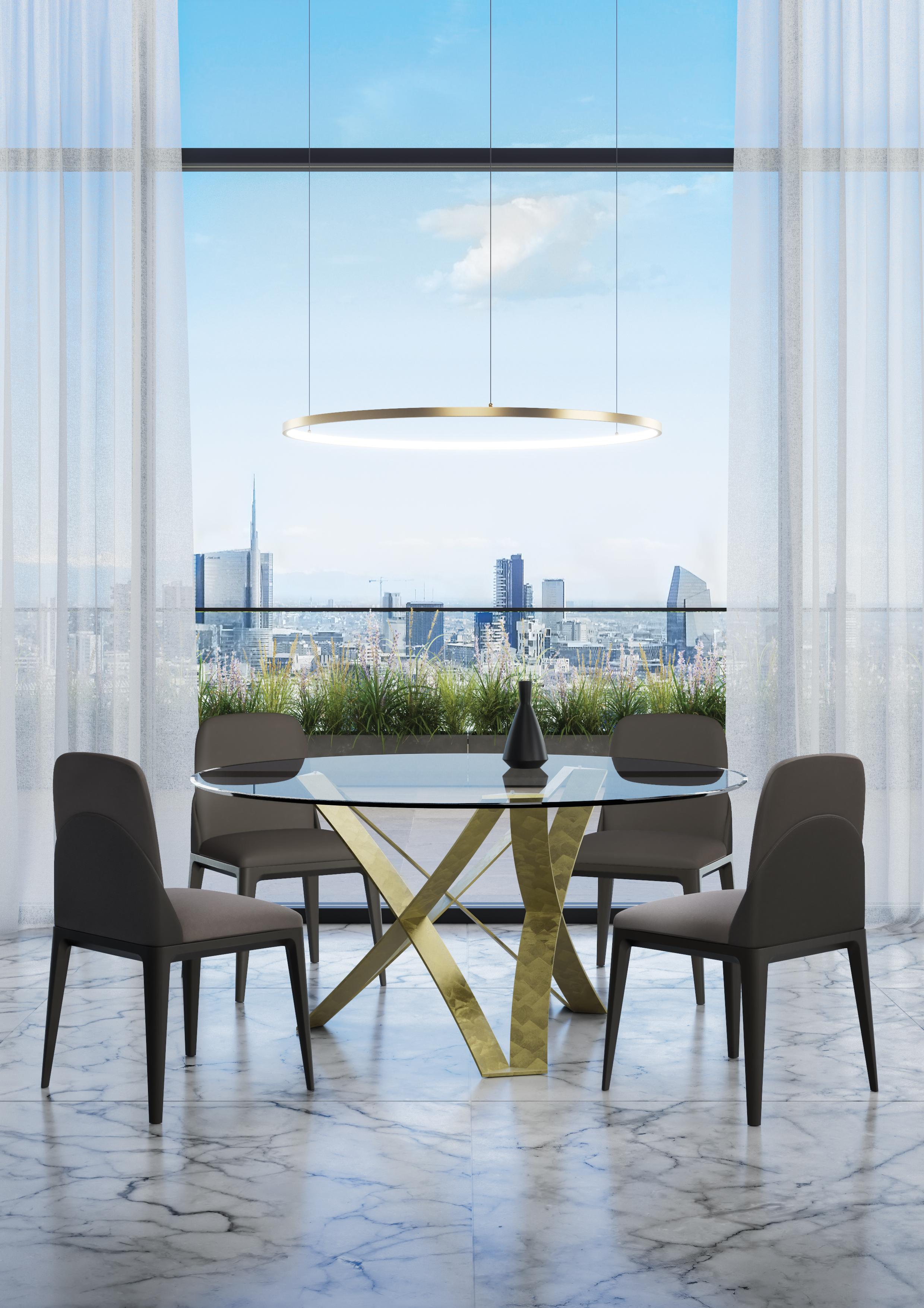Dioniso Dining Table by Chinellato Design
Dimensions: D 160 x H 73 cm
Materials: Top: Extra clear tempered glass.
Base: Large Gold Pieces 208.

Round dining table available in two sizes, offered with three combinations of base and Top finishes.
The