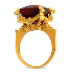 Dionysus and the Nymphs of Nysa Ring in 18kt Gold, Cushion Cut 20.98ct Garnet